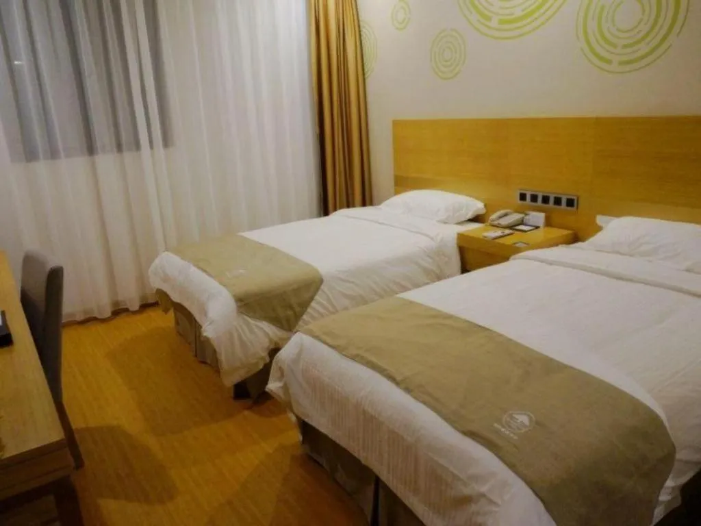 Bed in GreenTree Inn Suzhou Changshu North Haiyu Road Changhui Square Express Hotel
