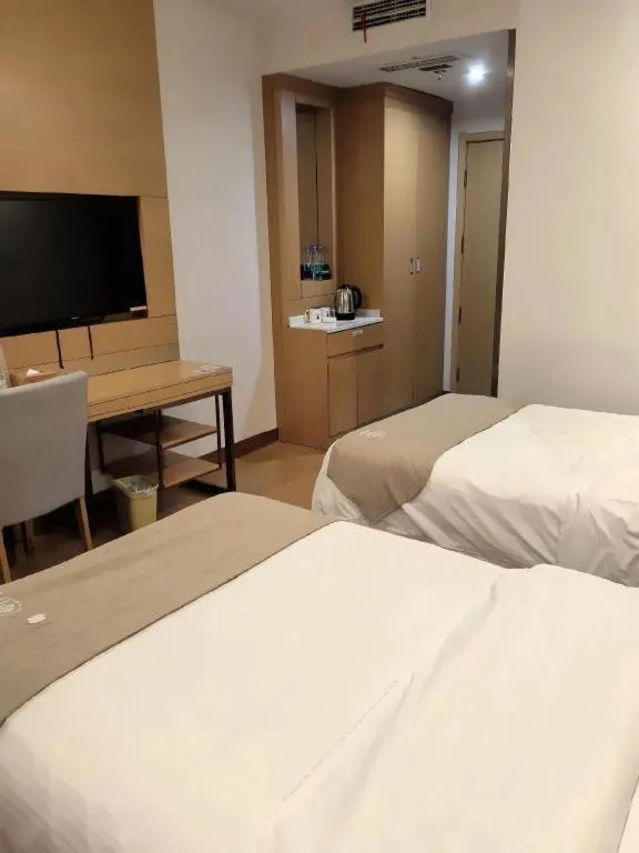 Bed in GreenTree Inn Suzhou Changshu North Haiyu Road Changhui Square Express Hotel