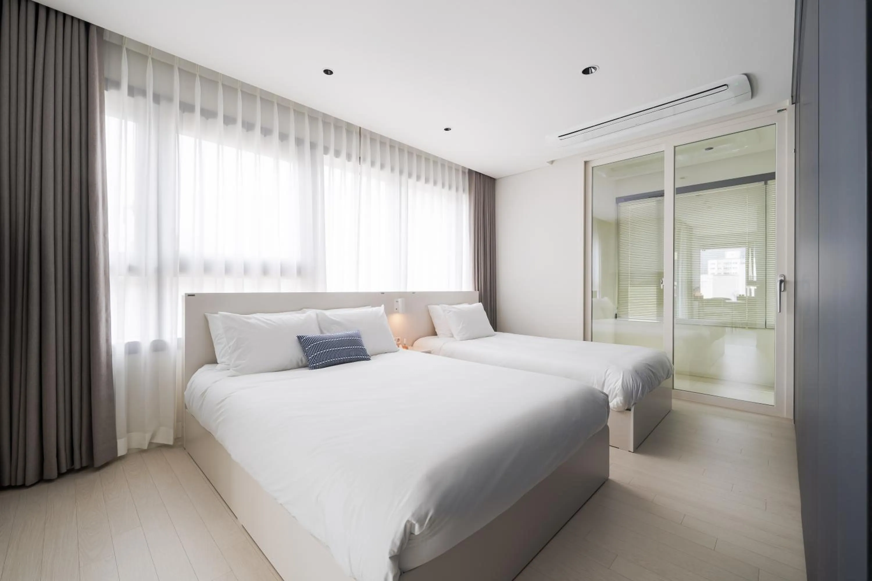 Bed in Le Collective Haeundae Paragraf