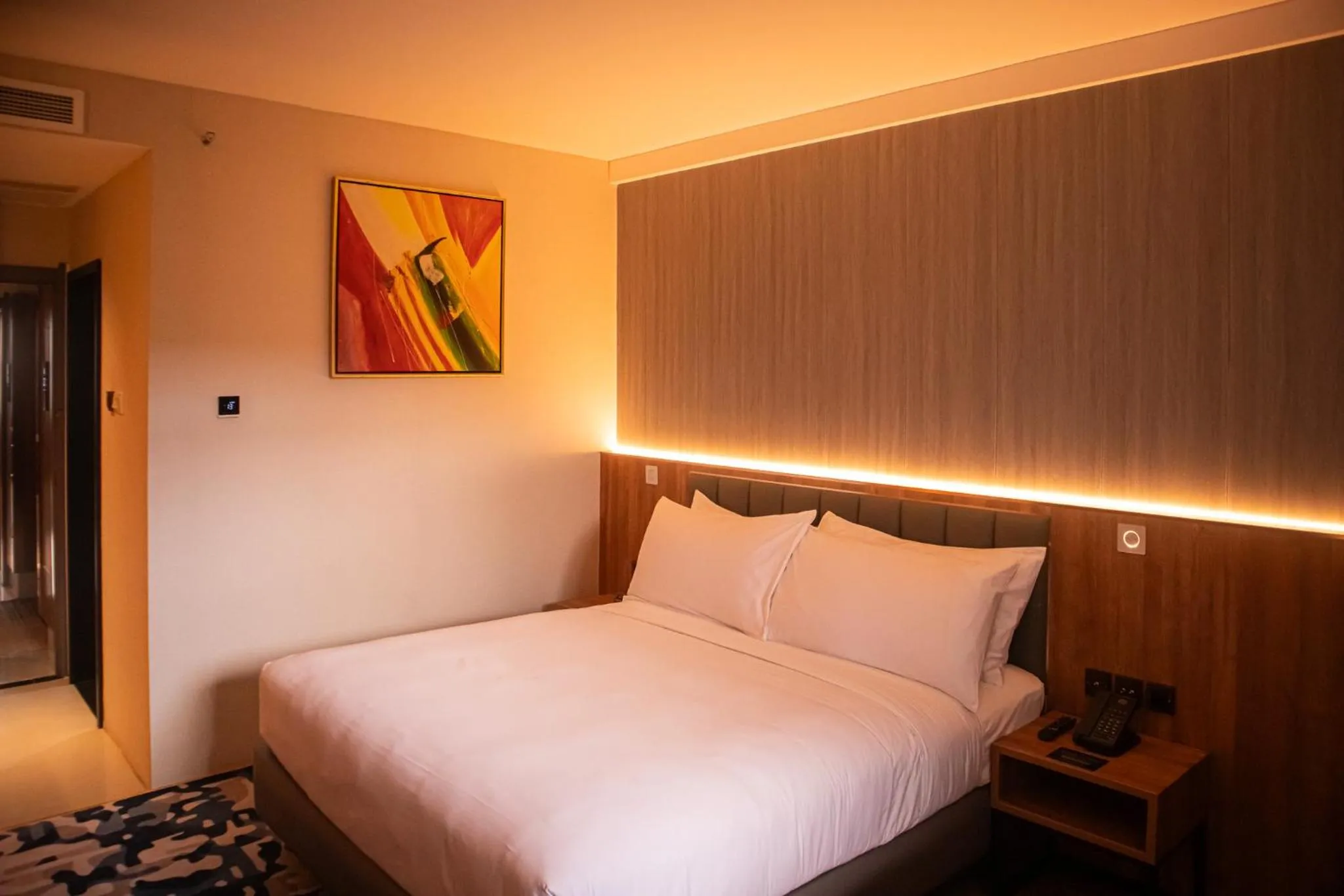 Bedroom, Bed in Aglow Hotel Harbor Bay Batam