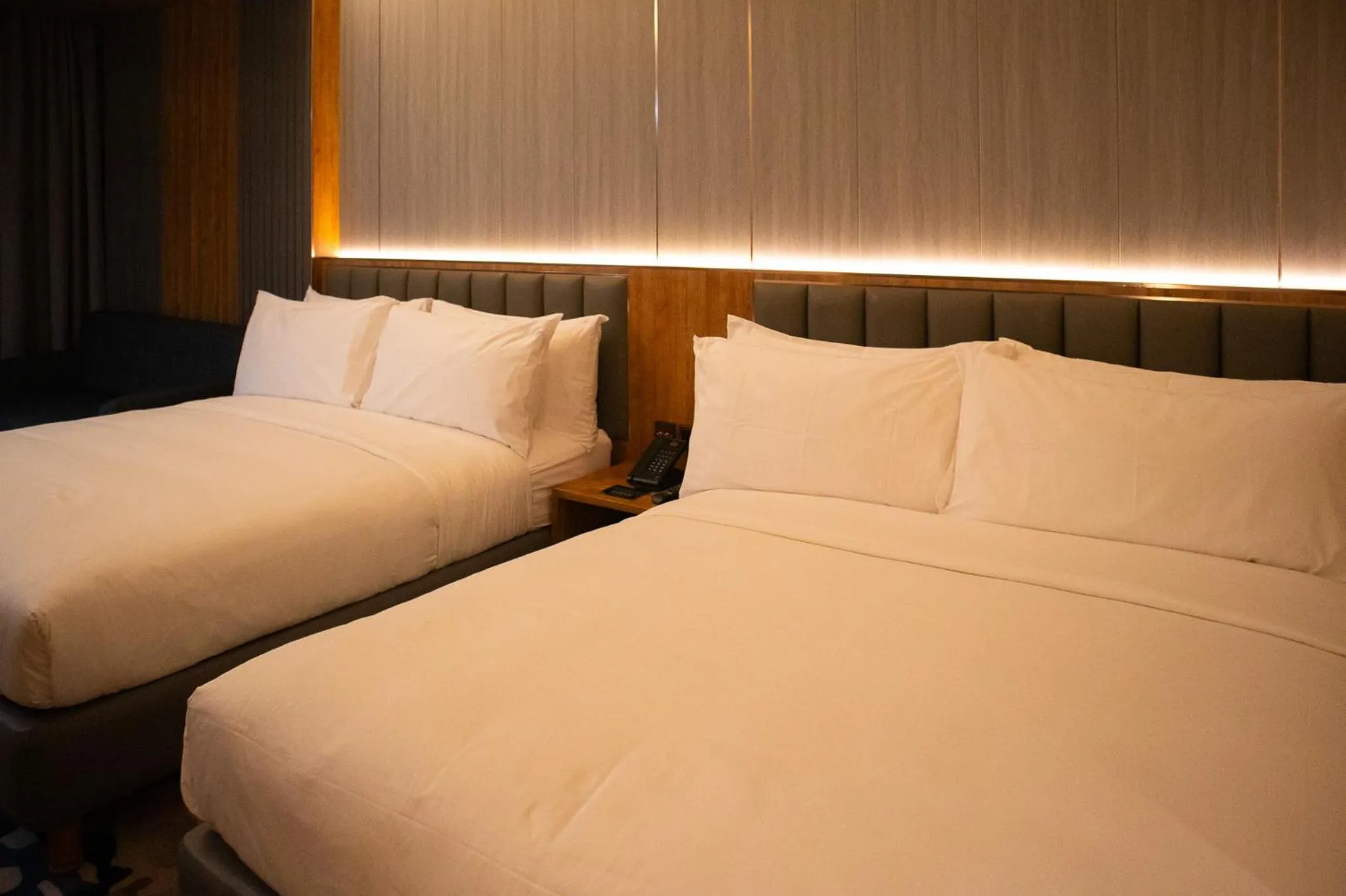 Bedroom, Bed in Aglow Hotel Harbor Bay Batam