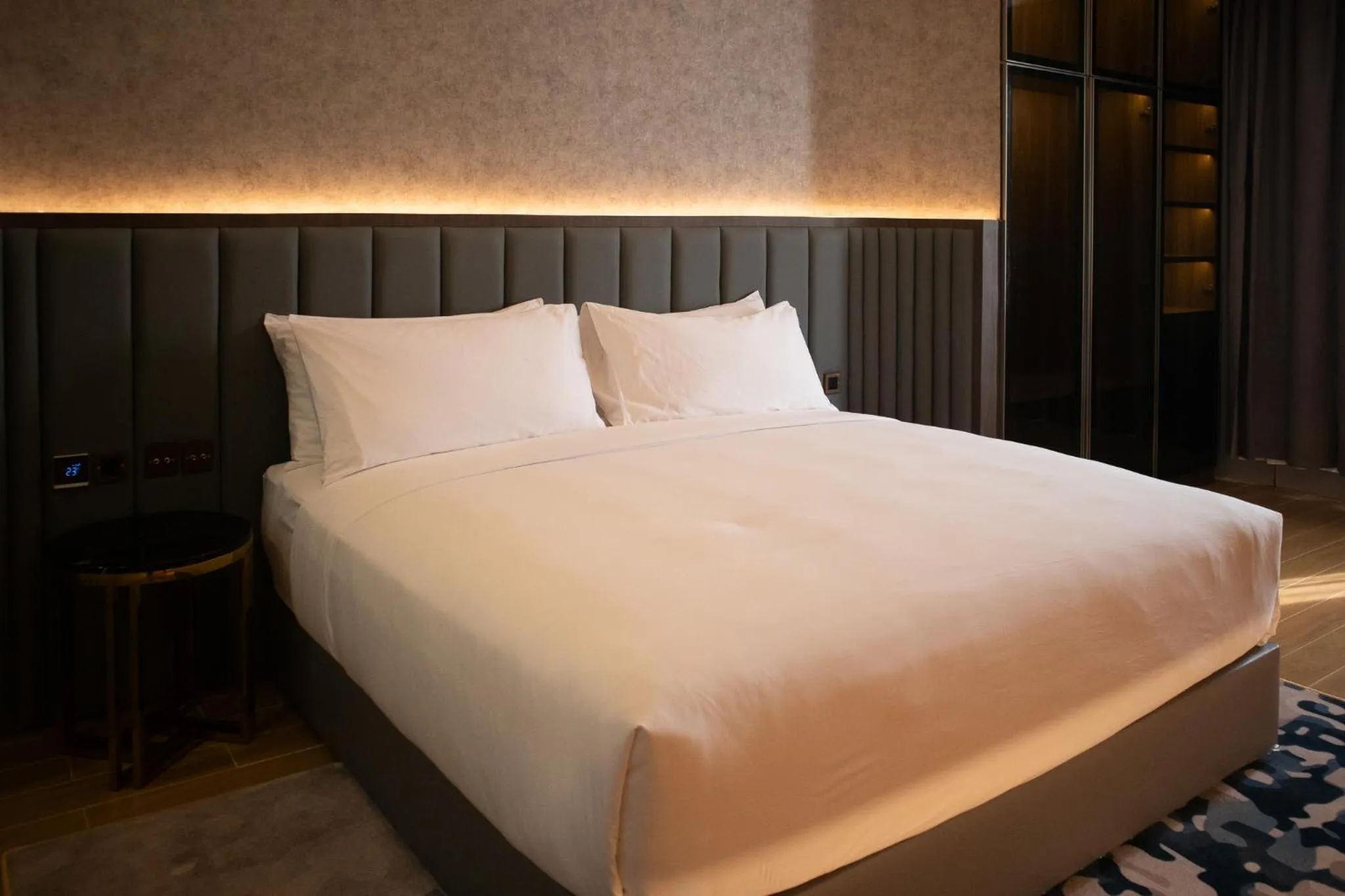 Bed in Aglow Hotel Harbor Bay Batam