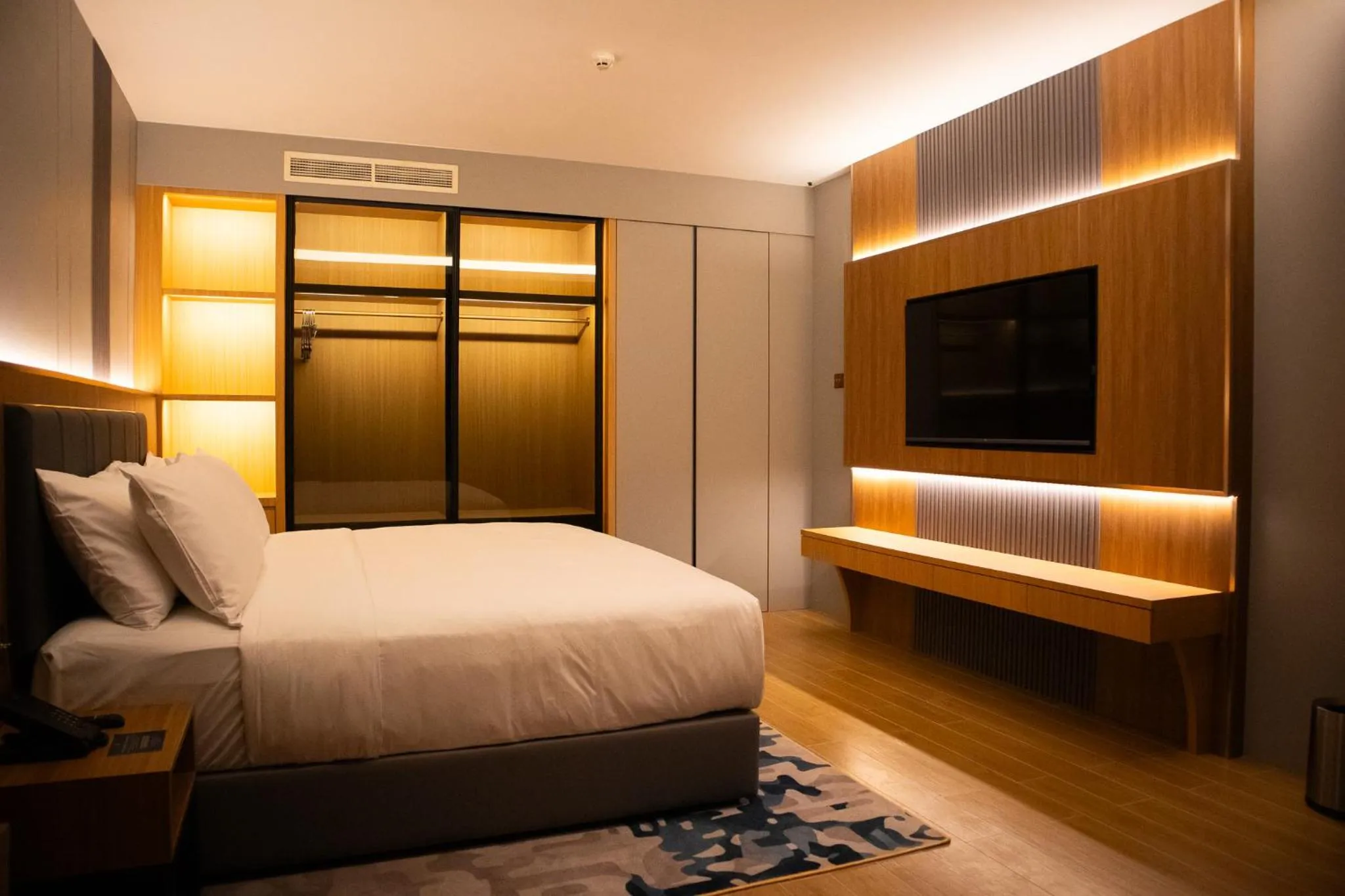 Bed in Aglow Hotel Harbor Bay Batam