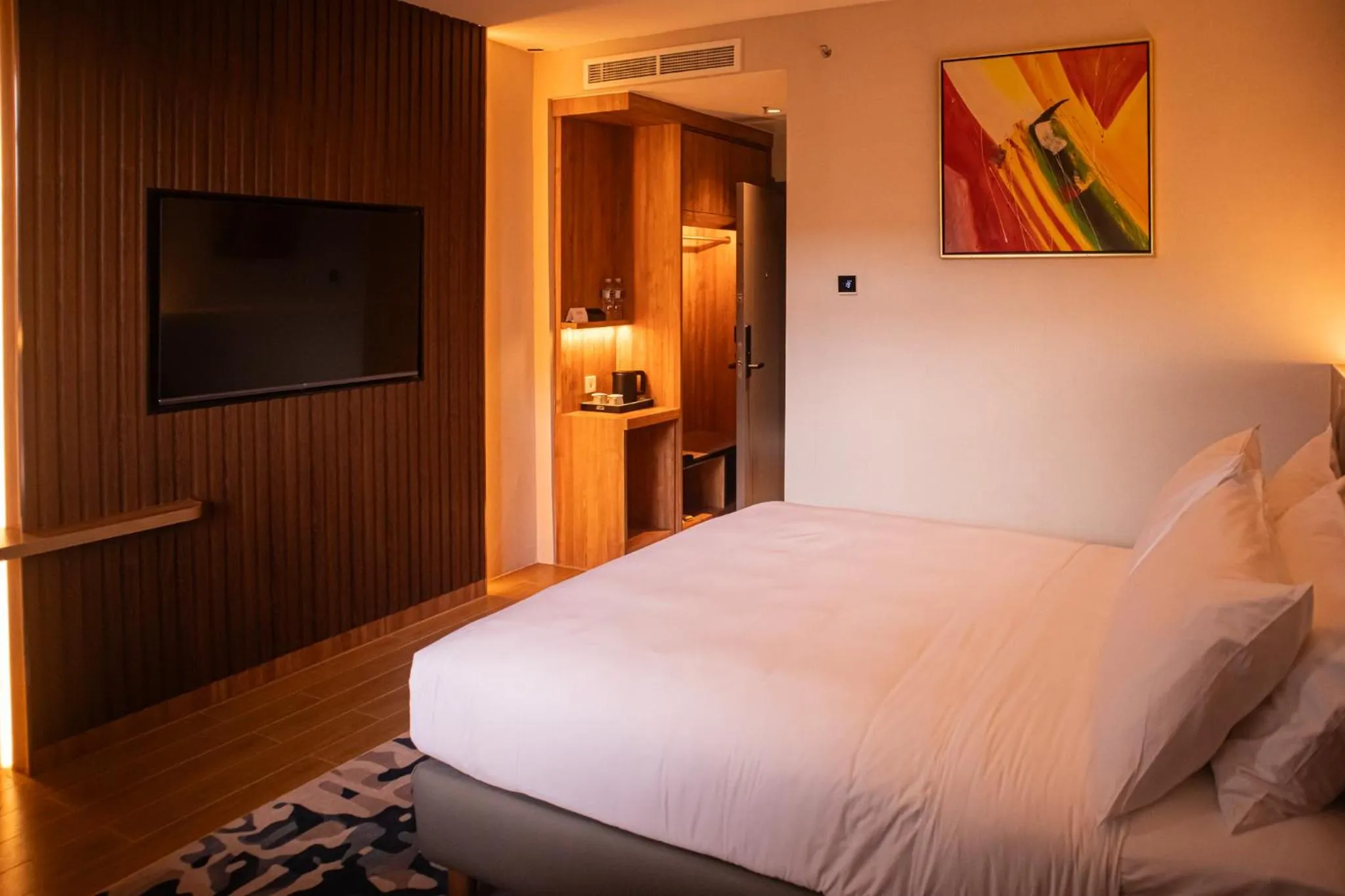 Bedroom, Bed in Aglow Hotel Harbor Bay Batam