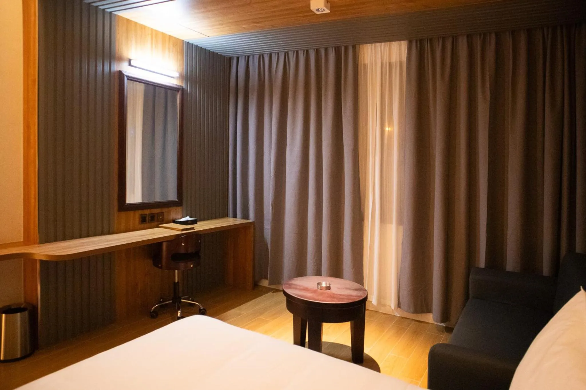 Bed in Aglow Hotel Harbor Bay Batam