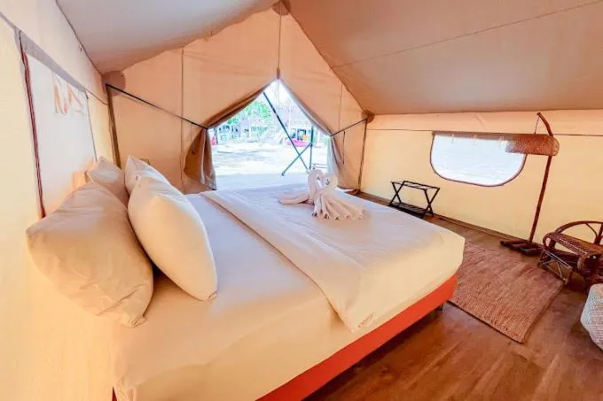 Bed in Slumber Party Beach Club and Resort Koh Phangan