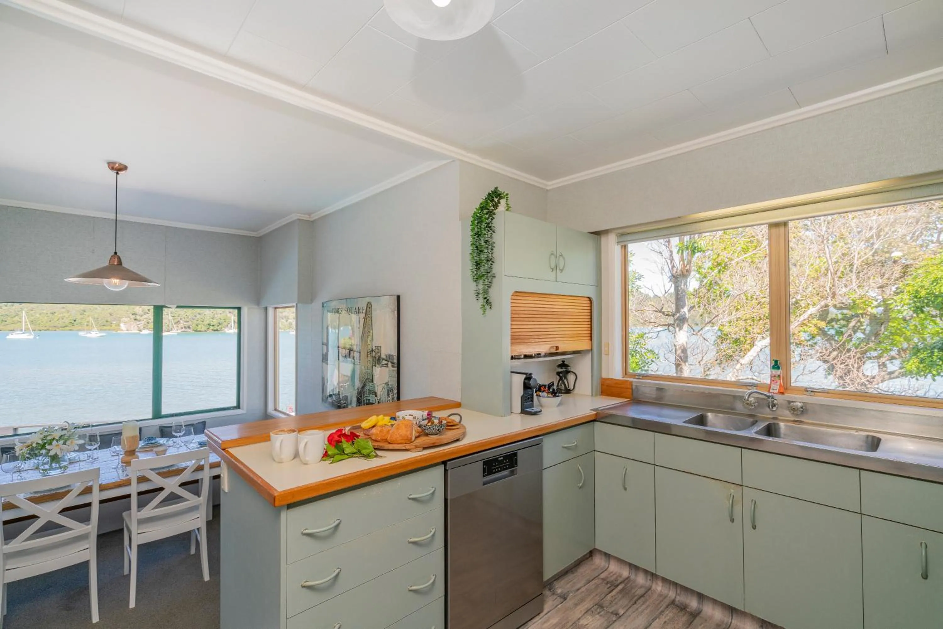 Kitchen or kitchenette in Oceans 88 Whitianga Coastal Suites