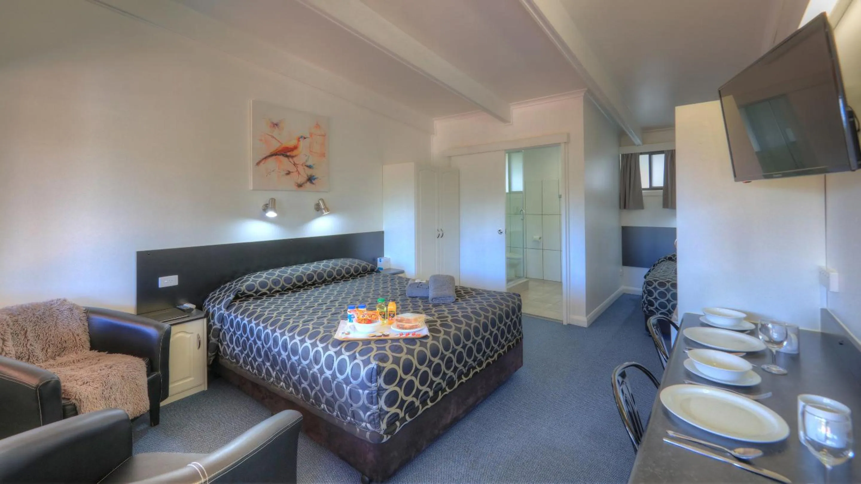 Bed in Twin Swans Motel