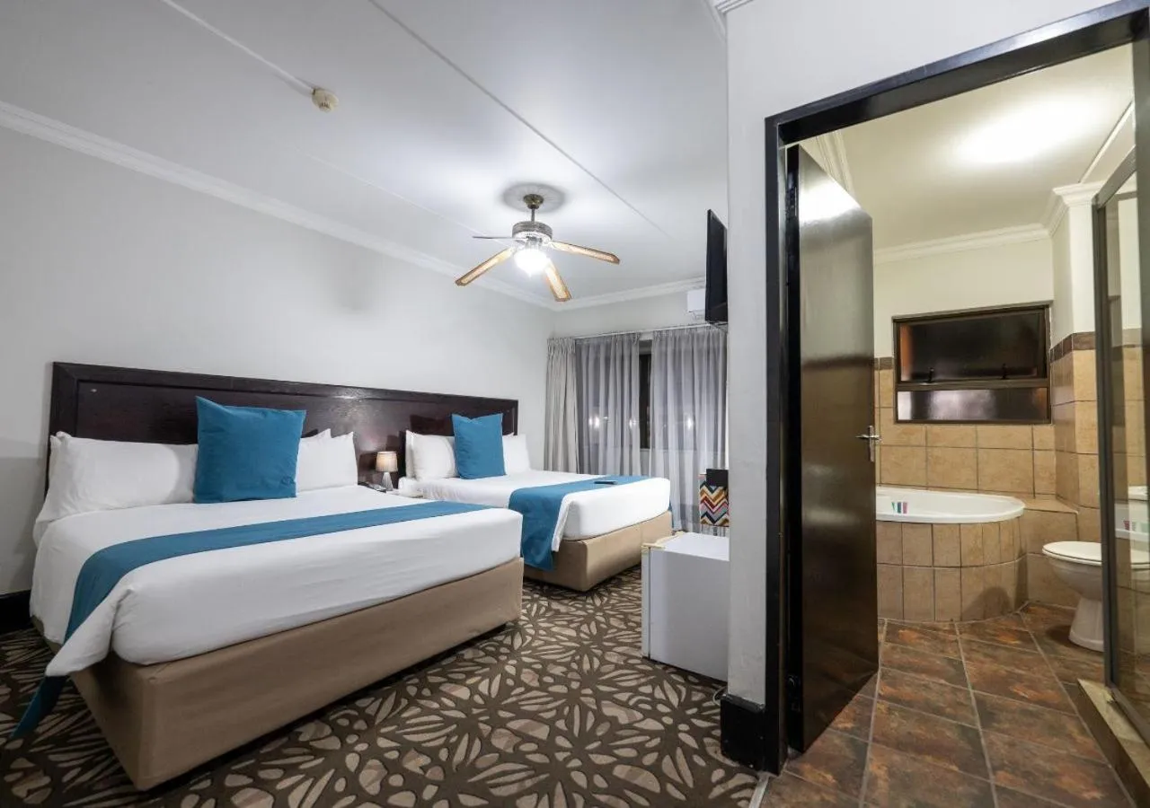 Bathroom, Bed in ANEW Hotel & Convention Centre OR Tambo Johannesburg