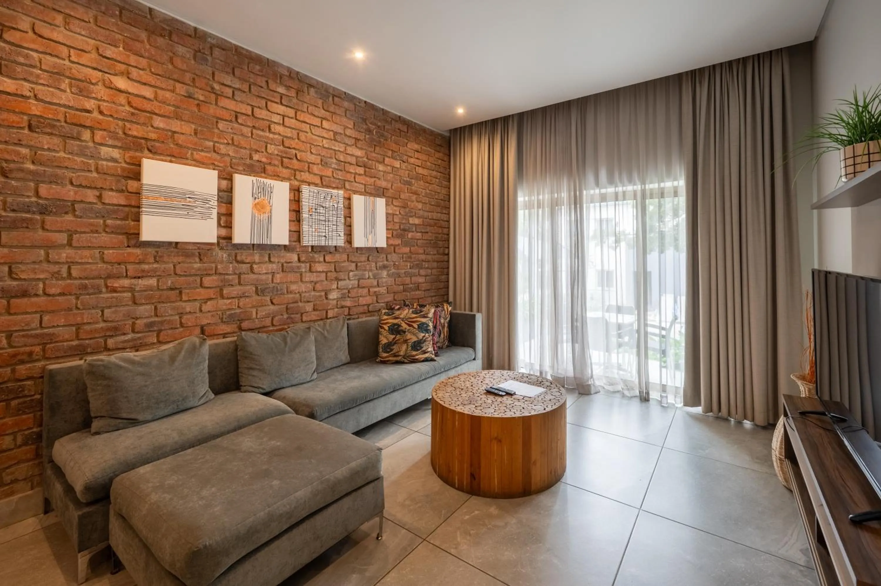 Living room in ANEW Hotel & Convention Centre OR Tambo Johannesburg