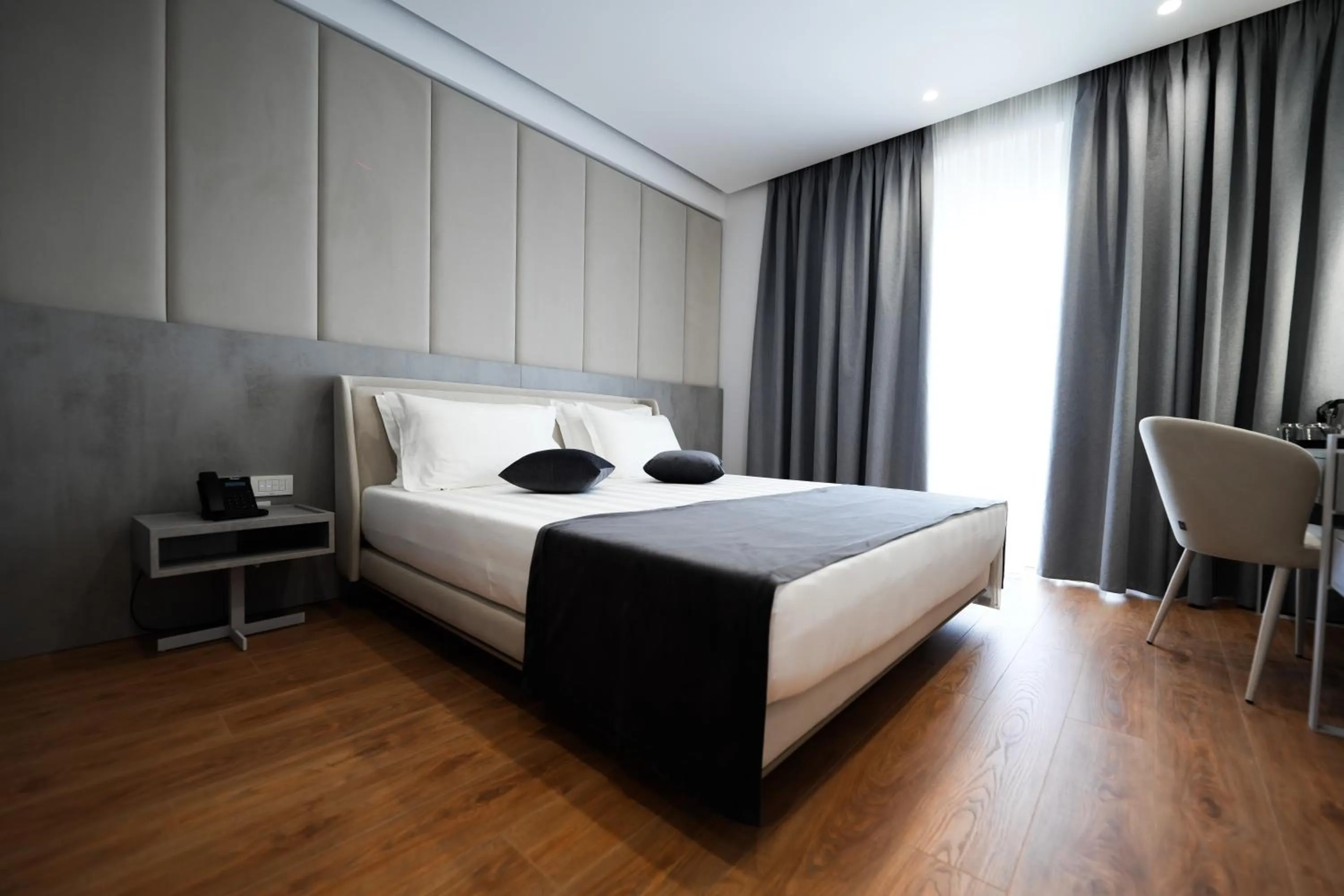 Photo of the whole room, Bed in Naos Luxury Hotel