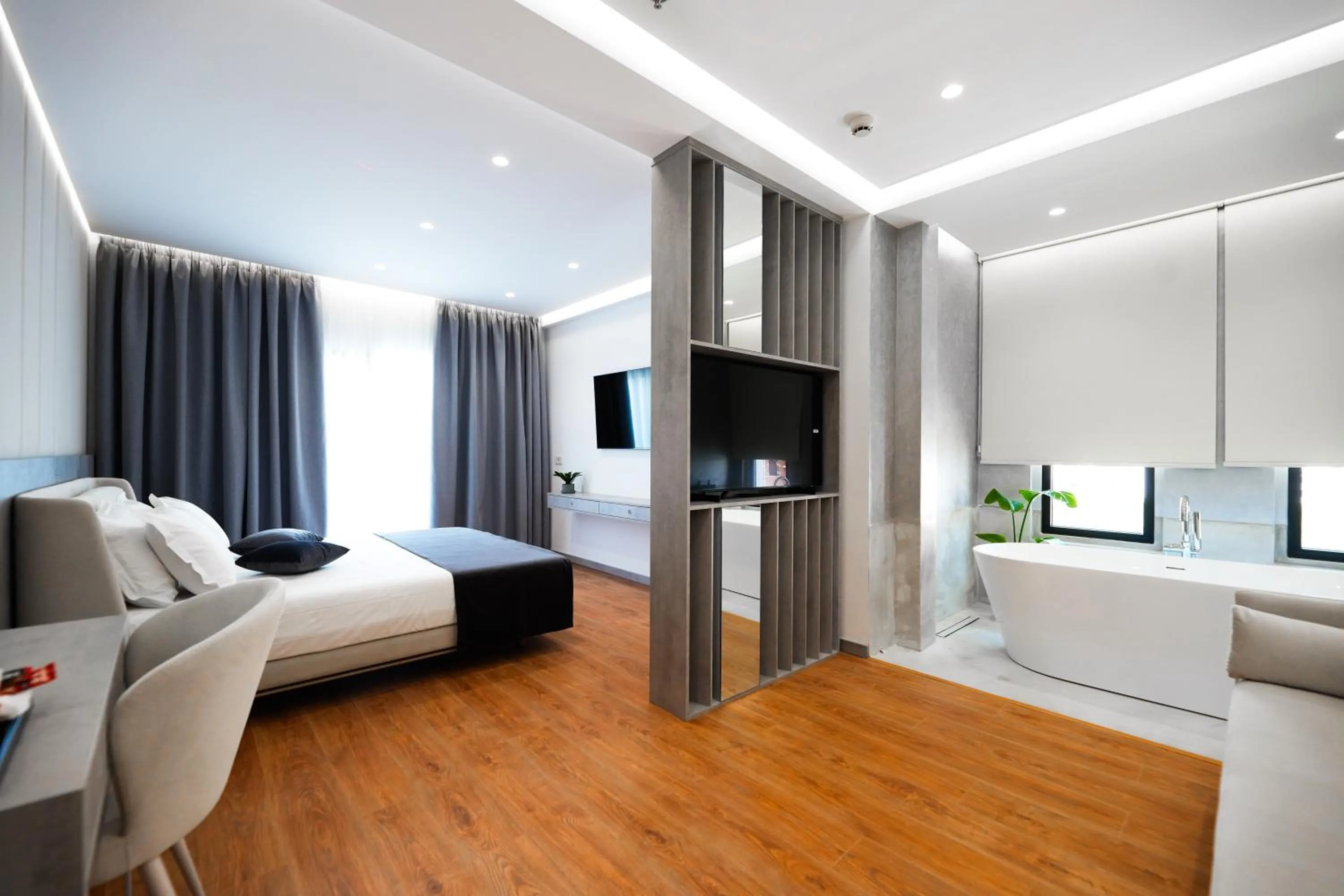 Photo of the whole room, Bed in Naos Luxury Hotel