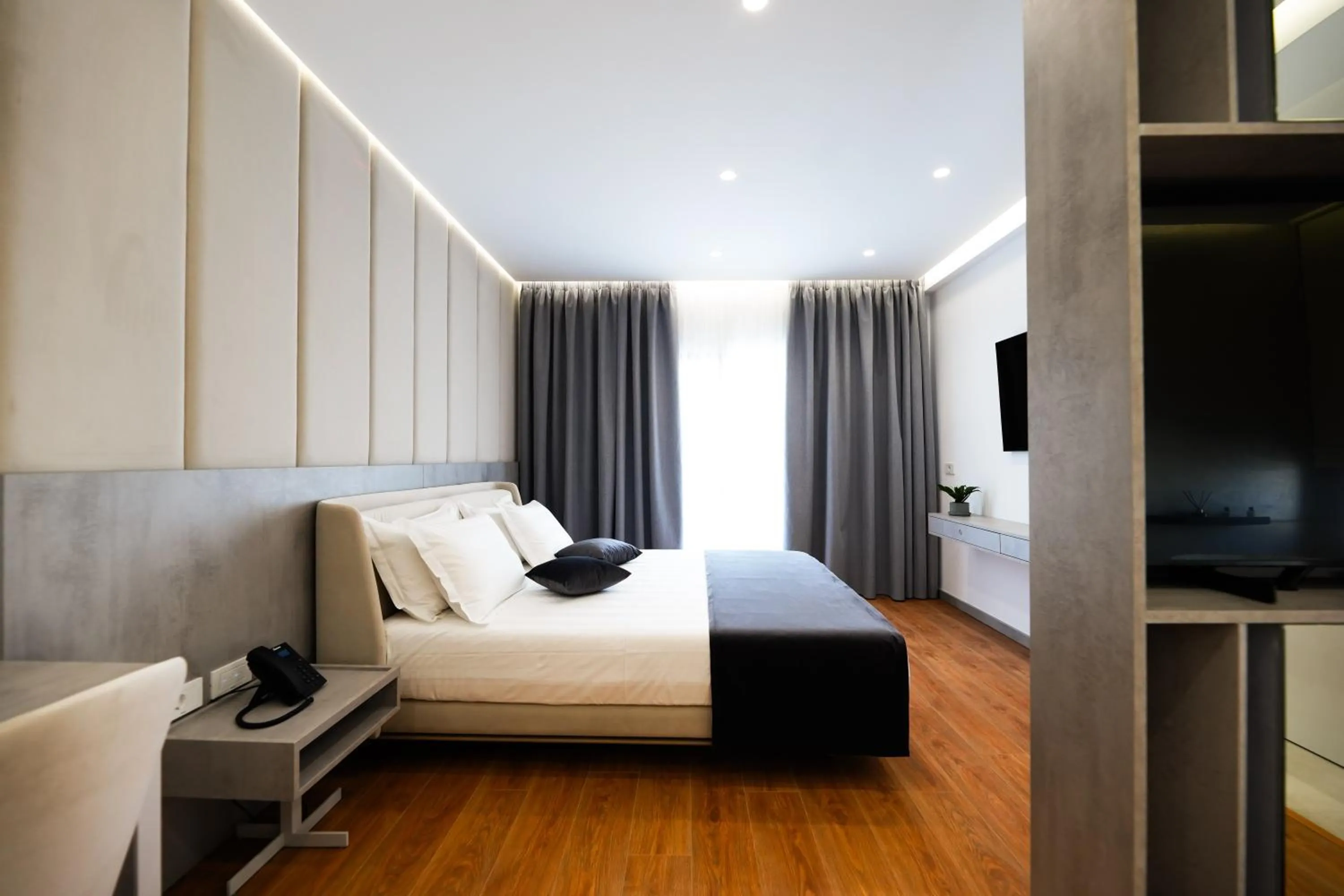 Photo of the whole room, Bed in Naos Luxury Hotel