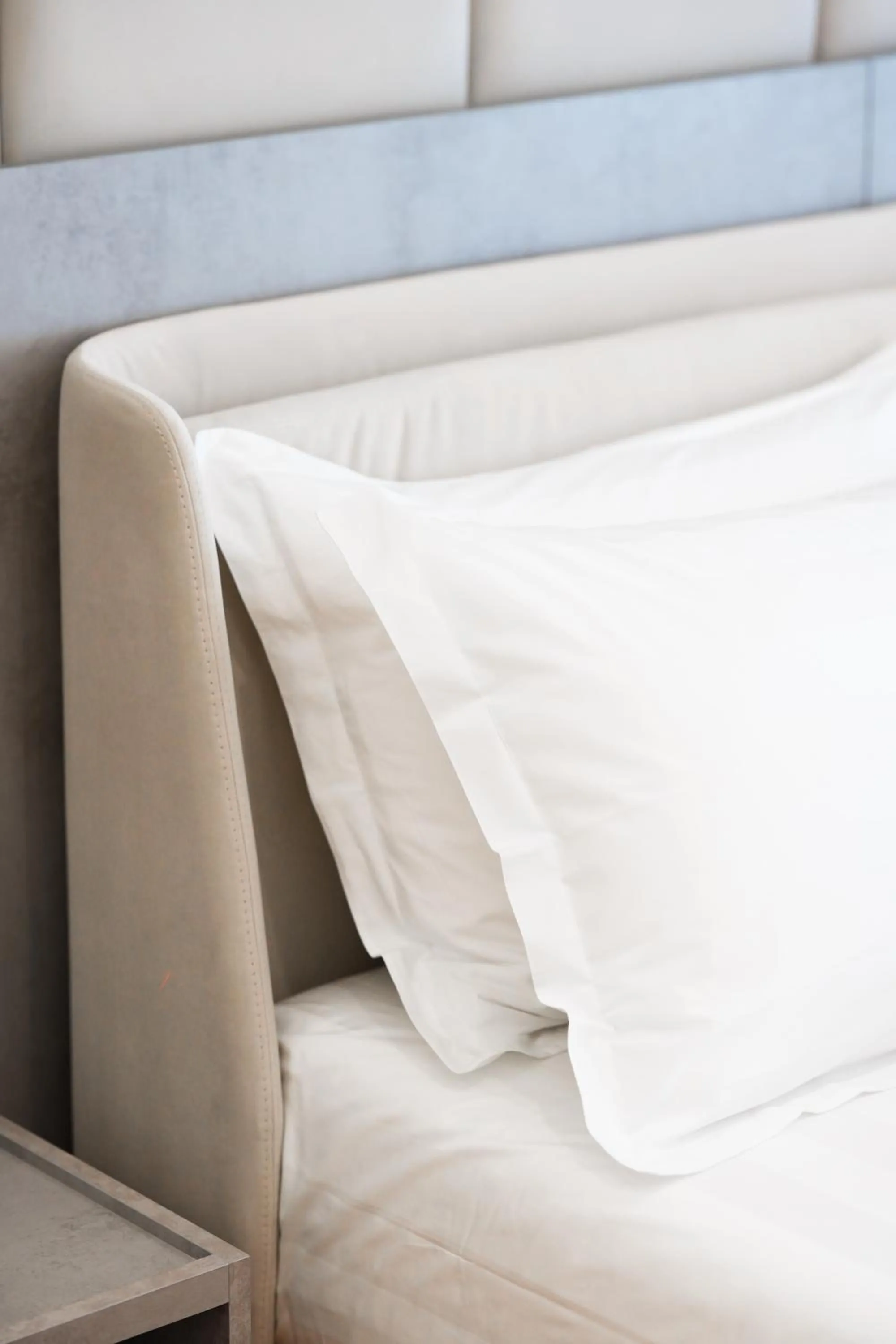 Bed in Naos Luxury Hotel