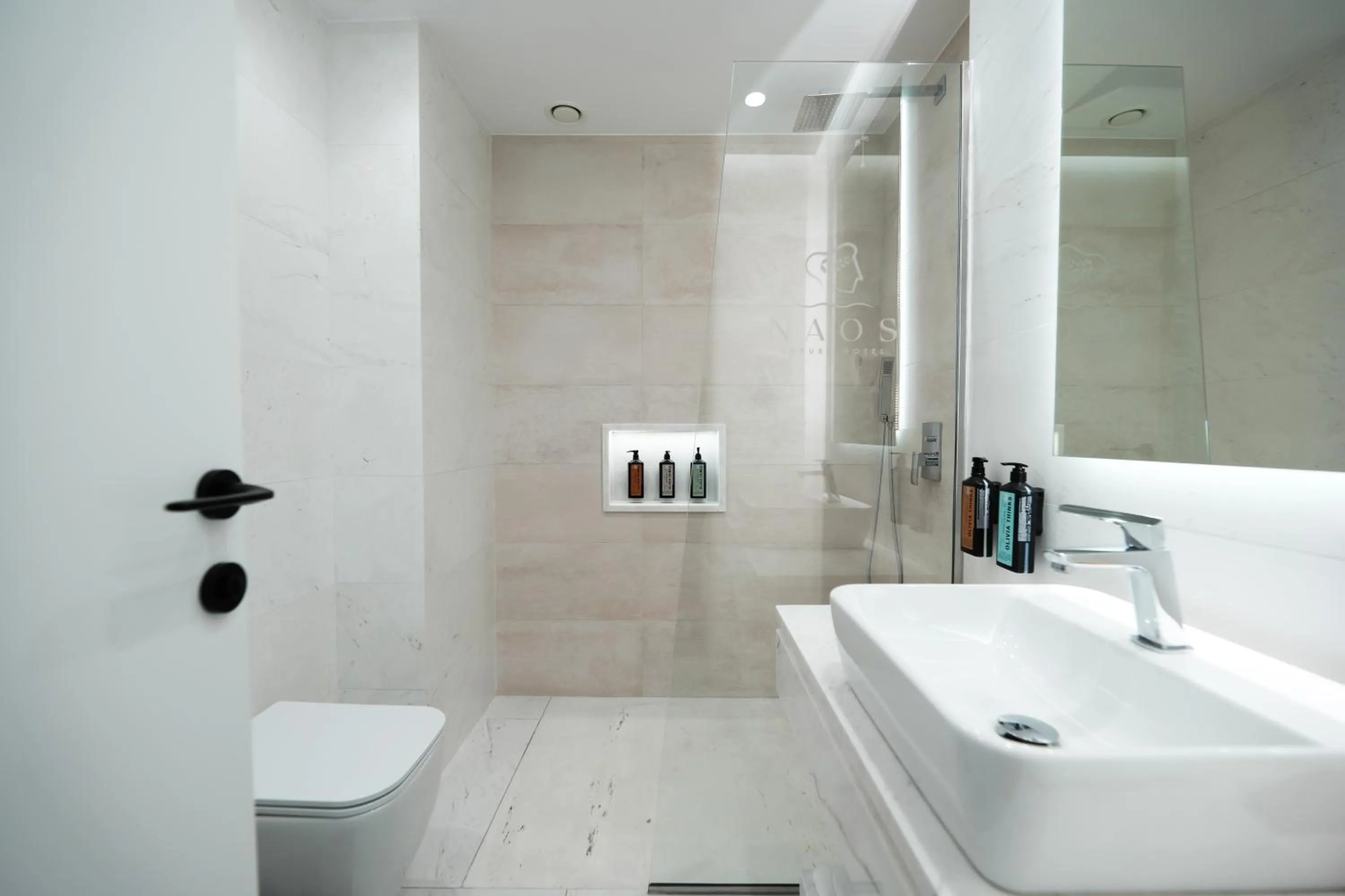 Toilet in Naos Luxury Hotel