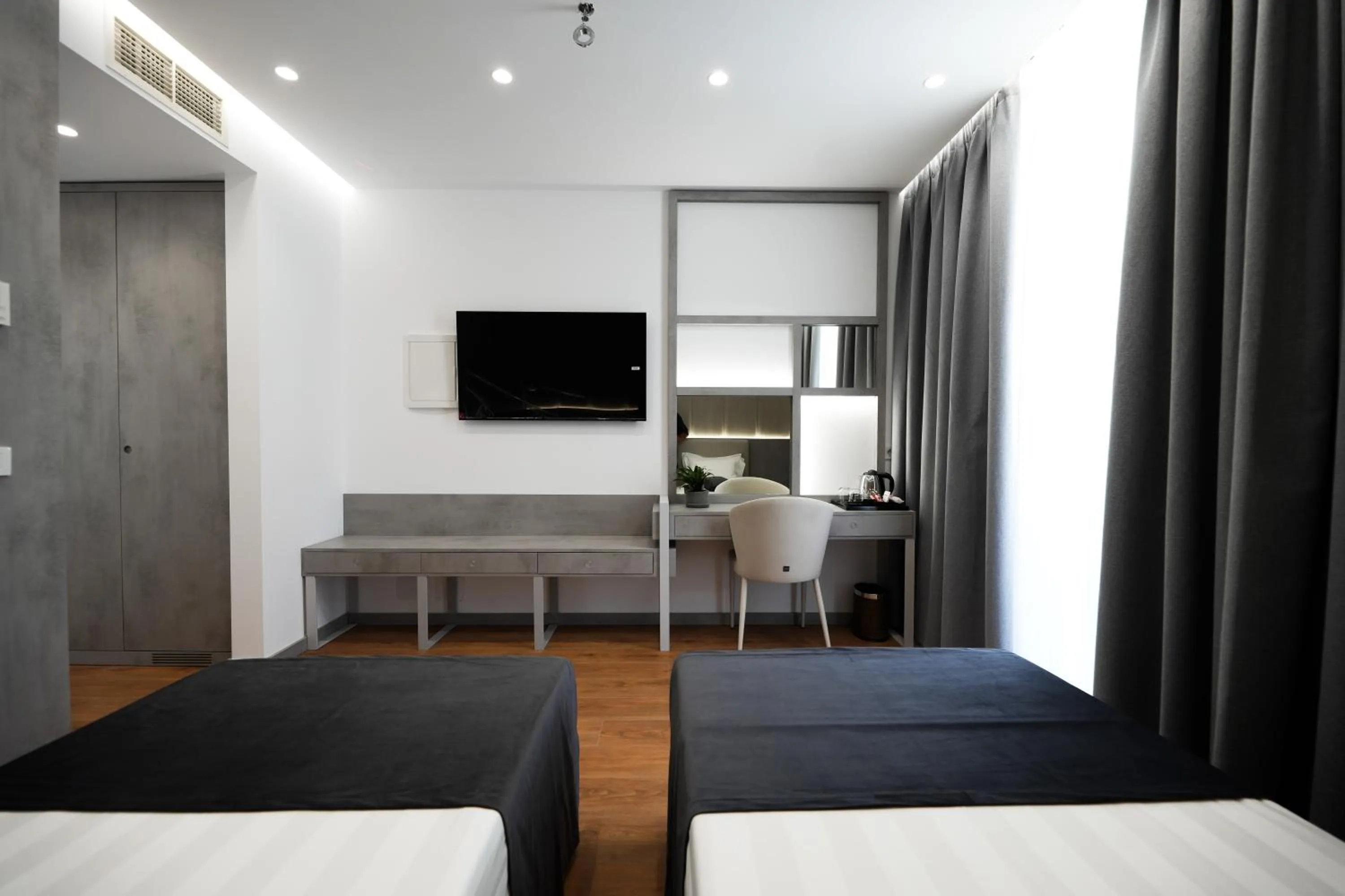 Photo of the whole room, Bed in Naos Luxury Hotel