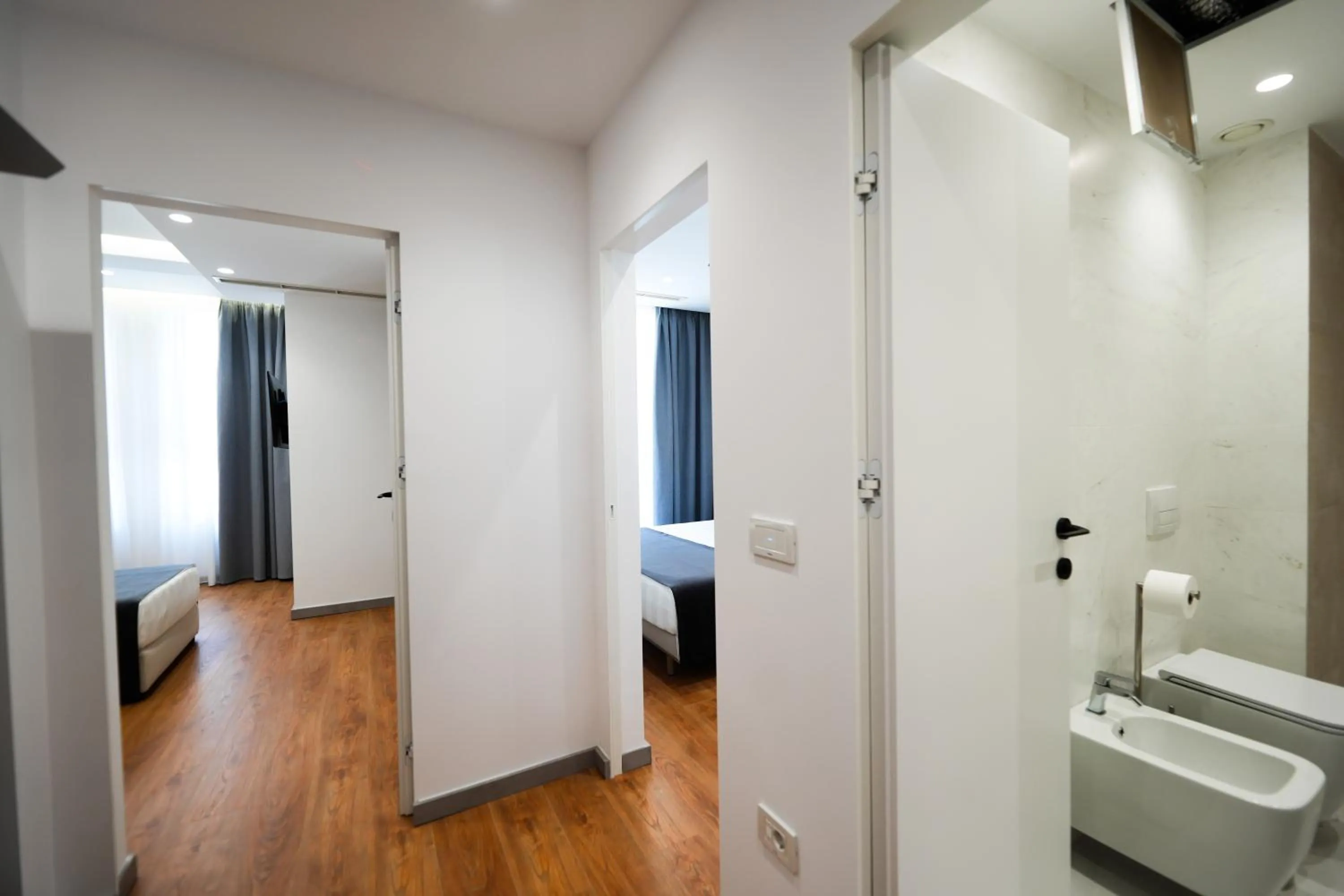 Bed in Naos Luxury Hotel