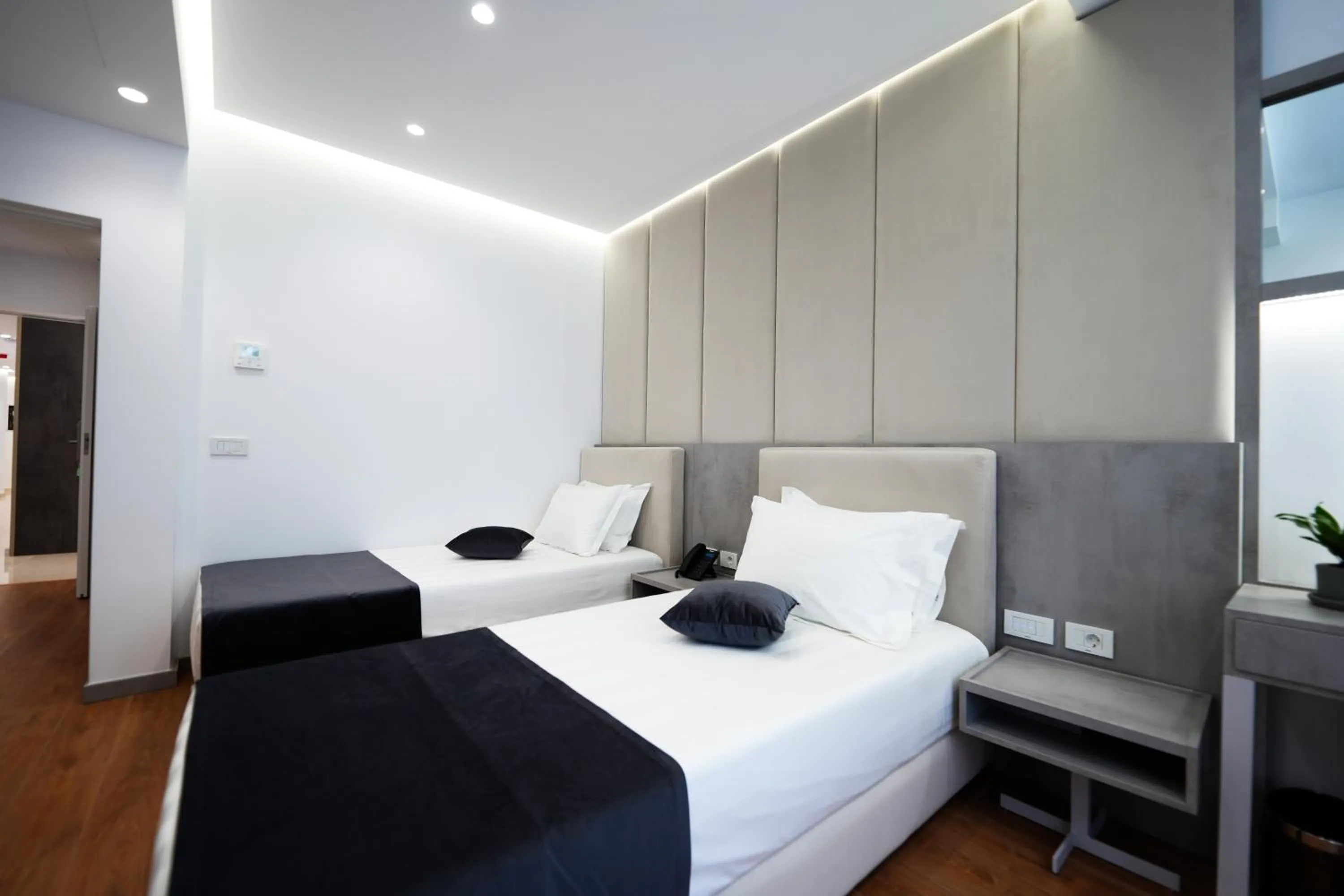 Photo of the whole room, Bed in Naos Luxury Hotel