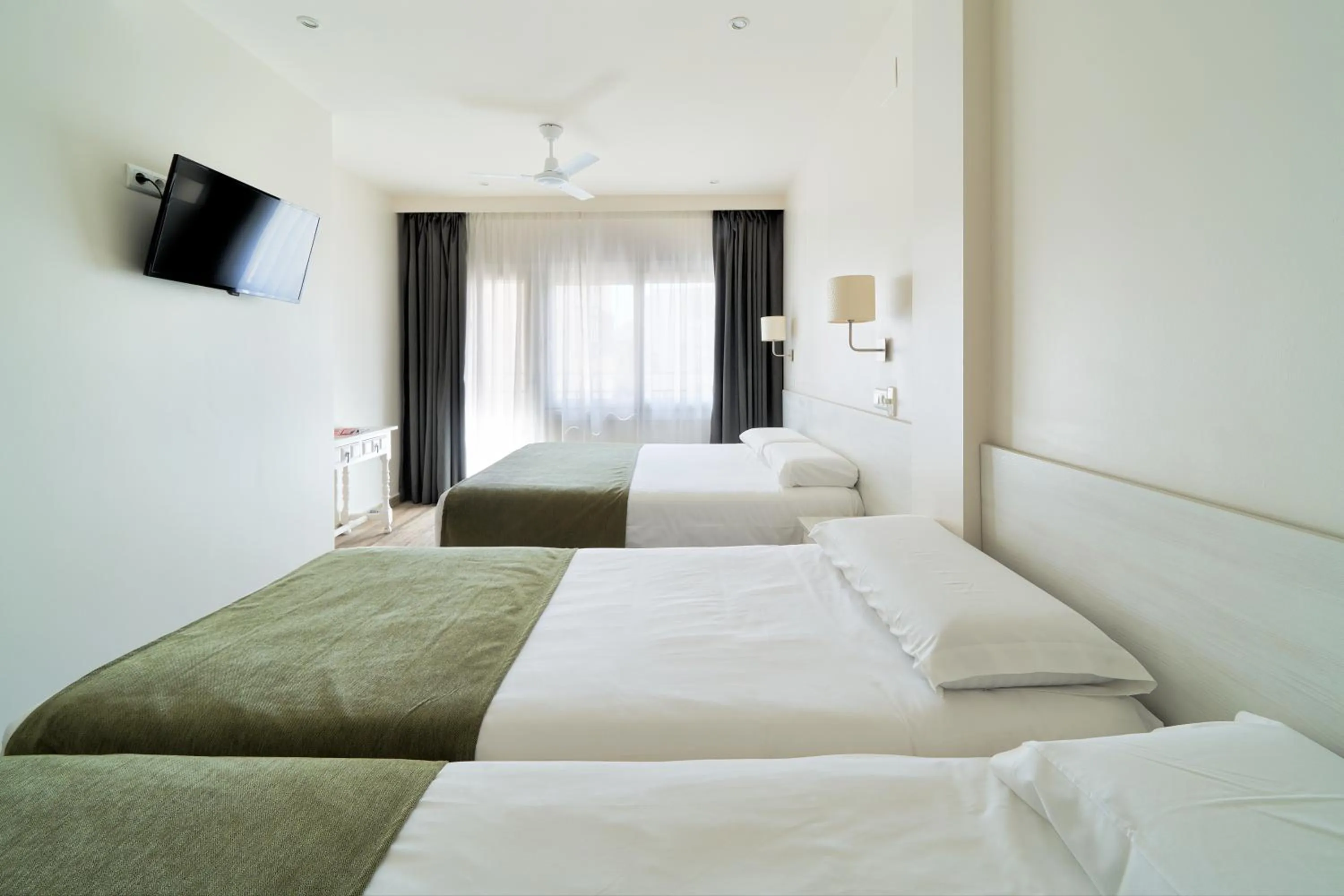 Bed in Hostal Sol y Miel