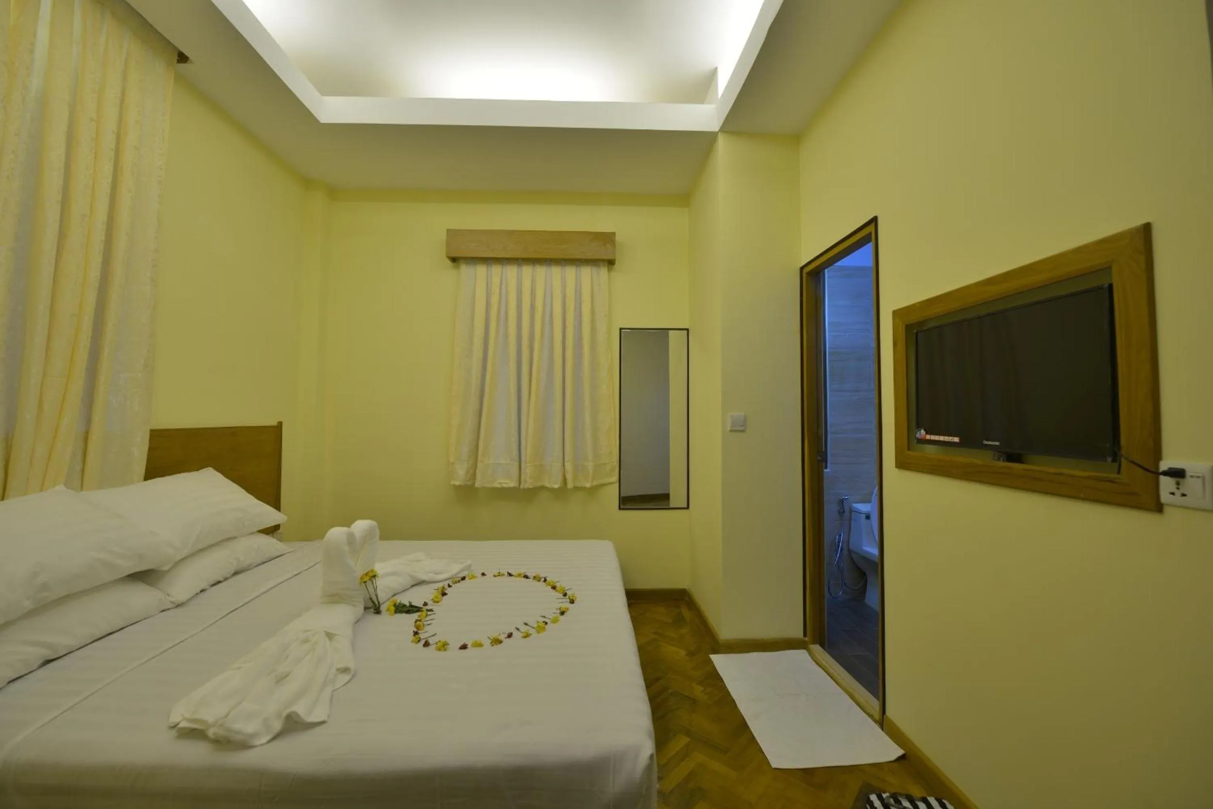 Bedroom in Northern Breeze Hotel