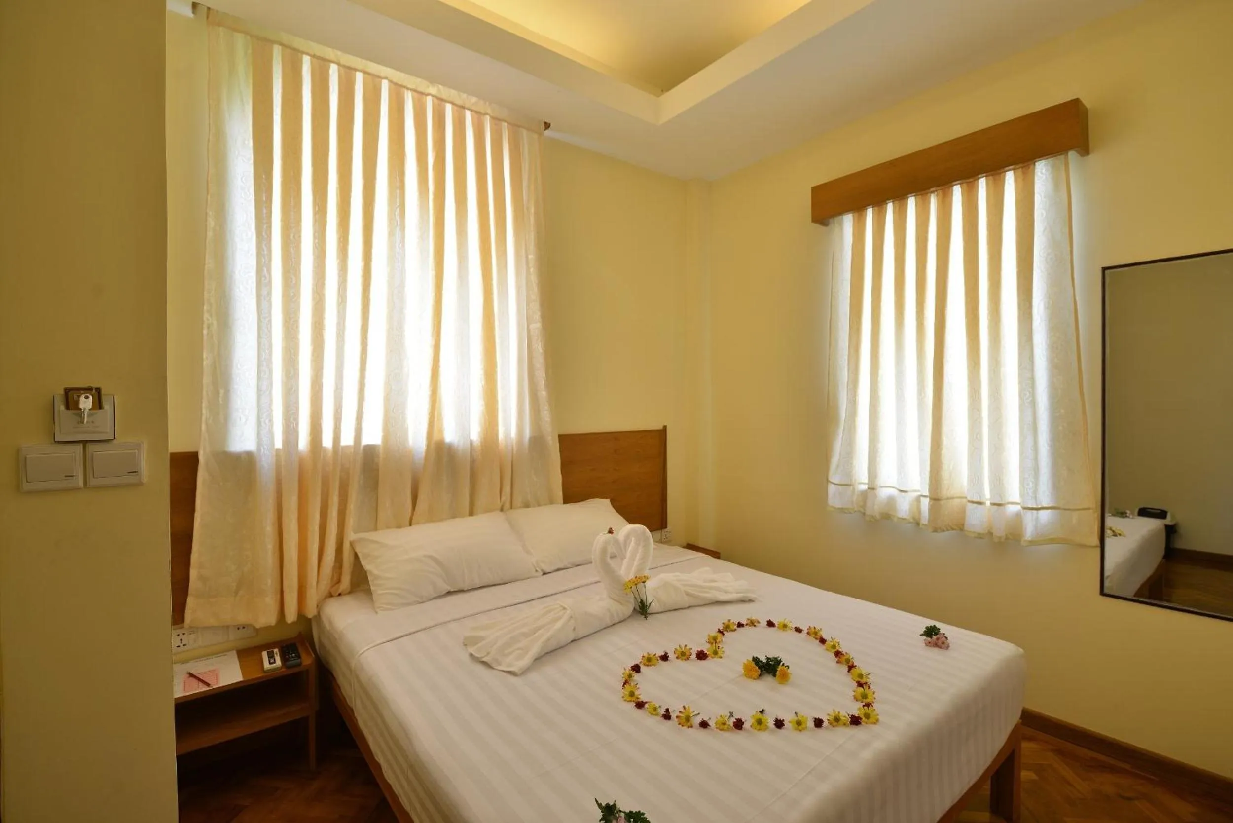 Bedroom in Northern Breeze Hotel