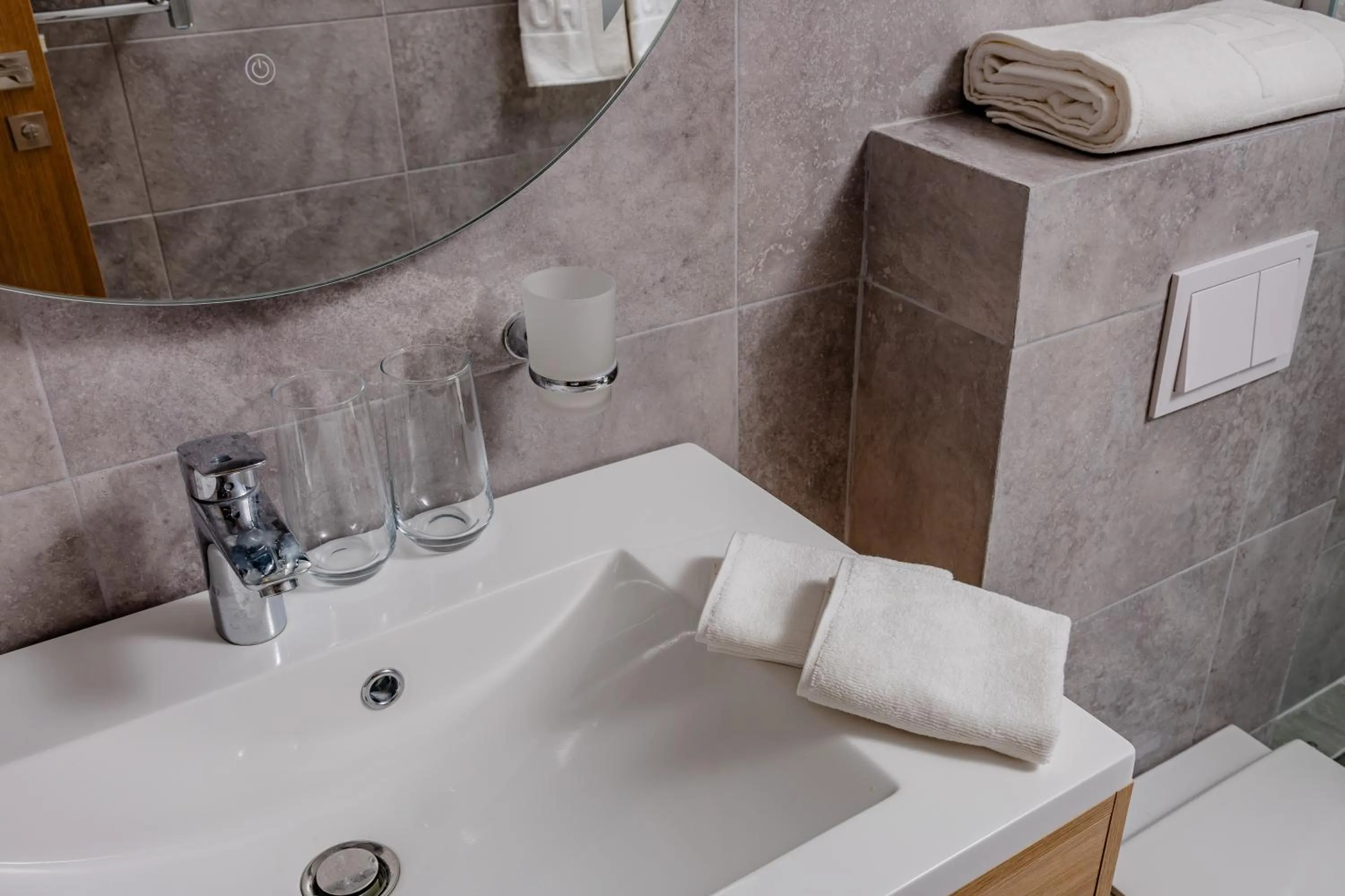 Bathroom in Hotel AQUILO