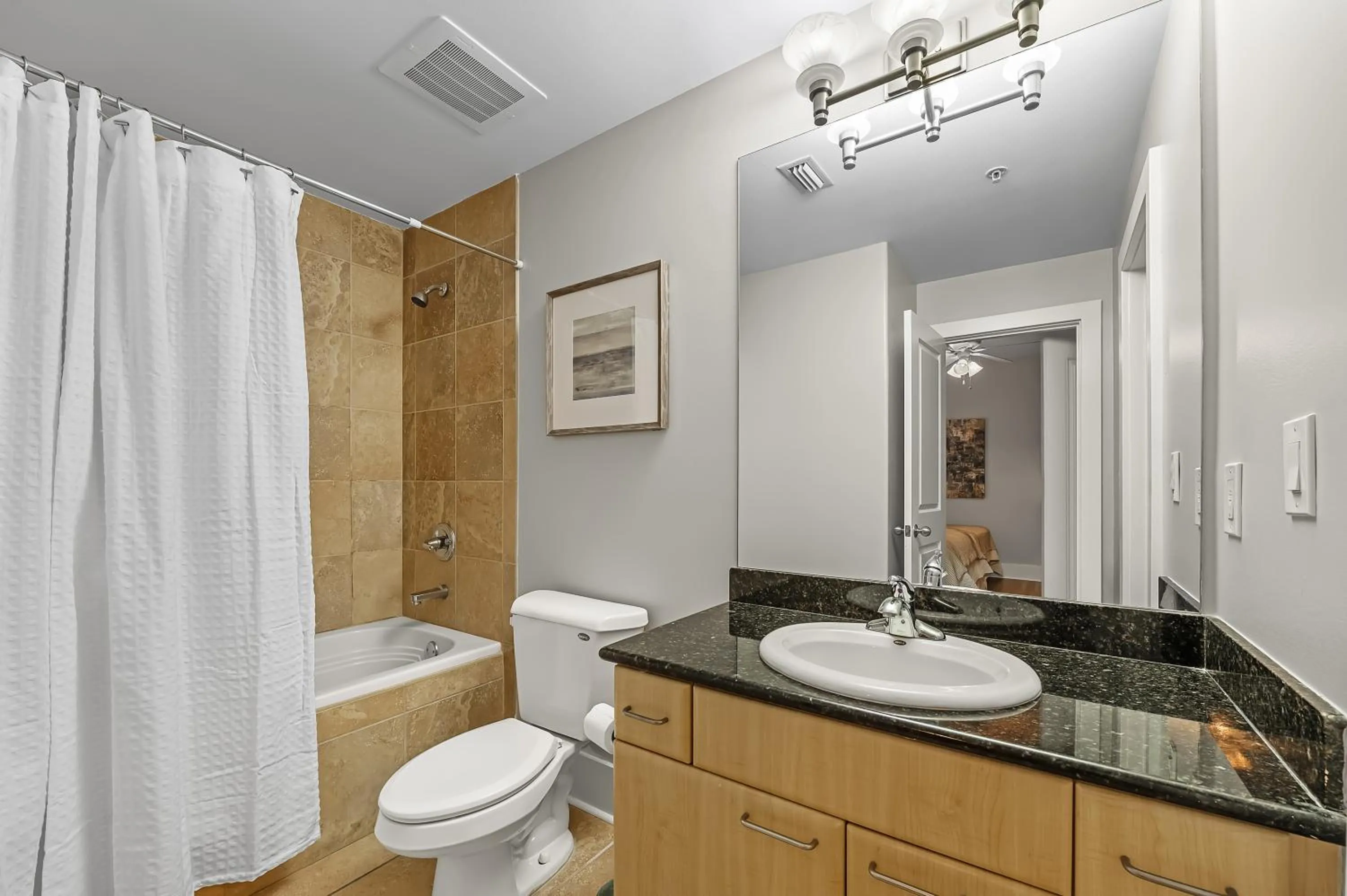 Bathroom in Caribe Resort by Hosteeva