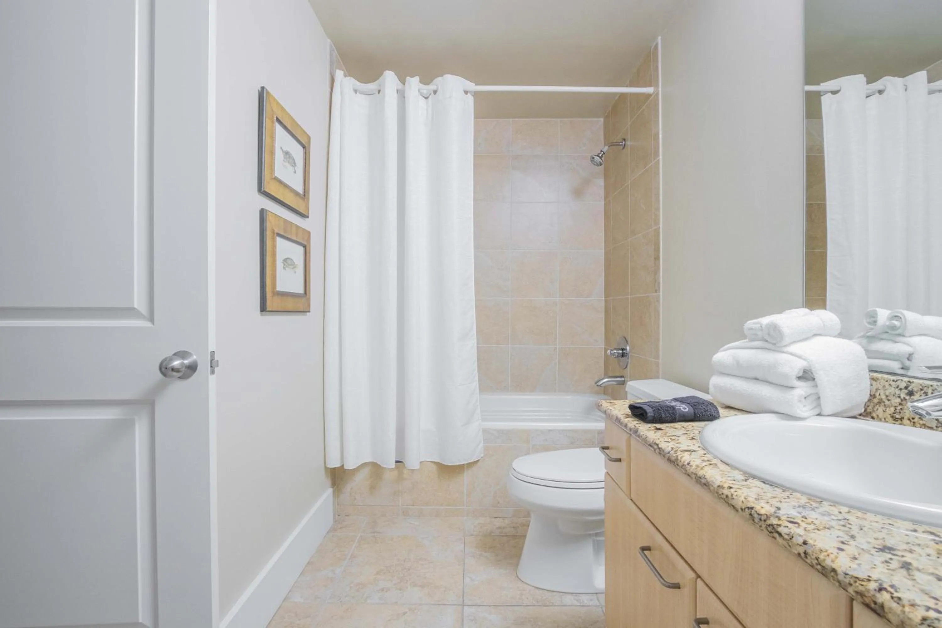 Bathroom in Caribe Resort by Hosteeva