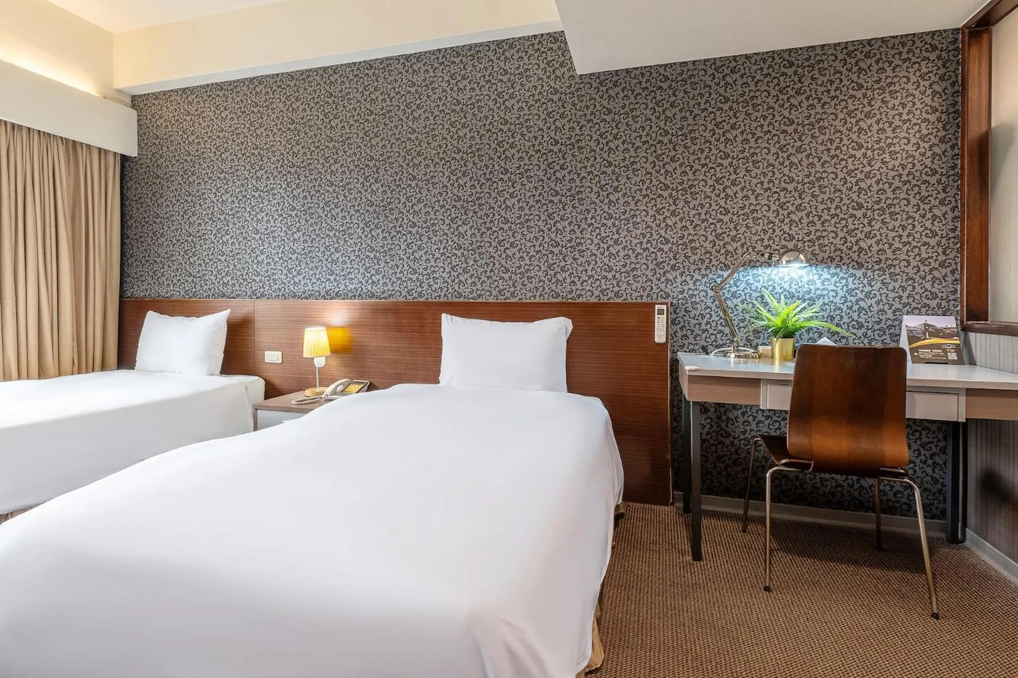 Bed in The Galerie Hotel