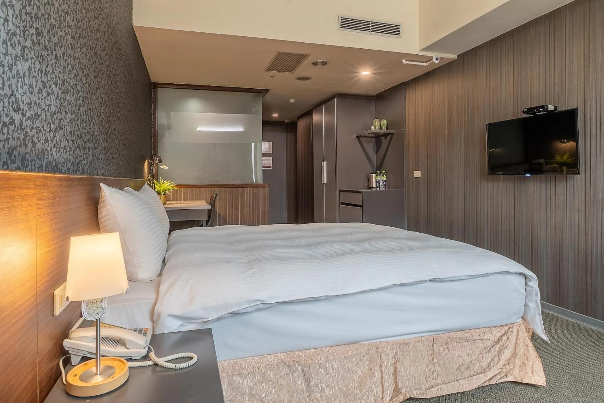 Bed in The Galerie Hotel