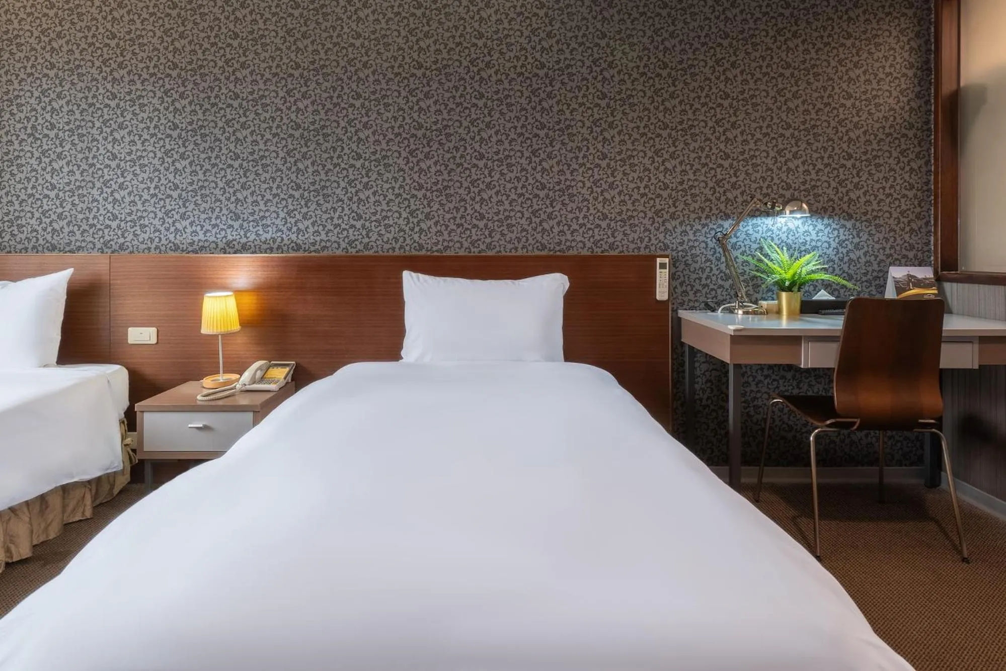 Bed in The Galerie Hotel