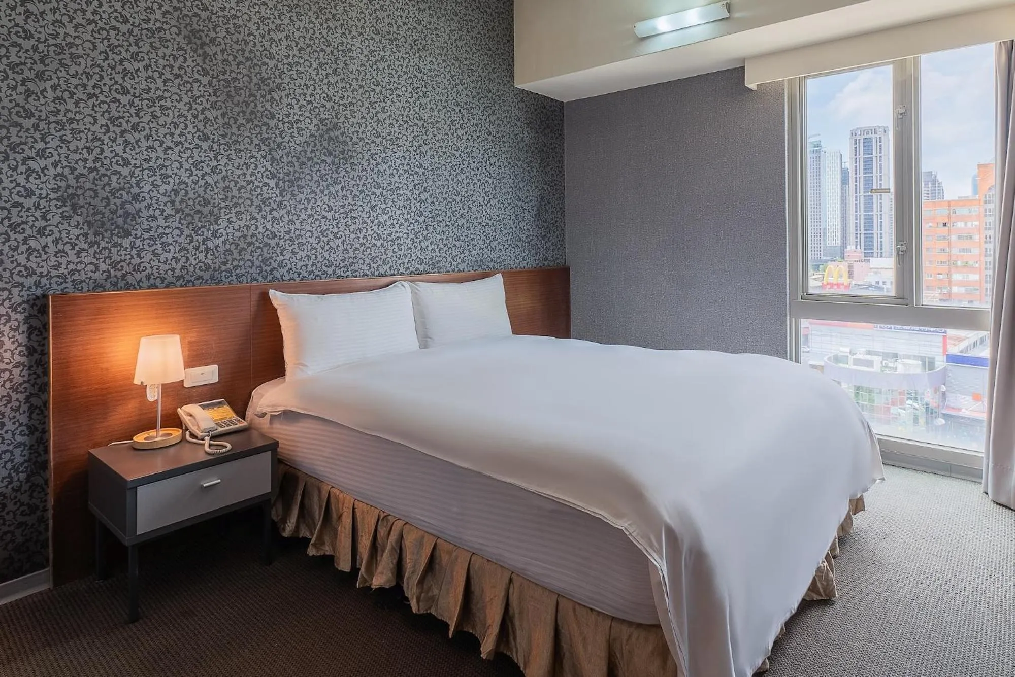 Bed in The Galerie Hotel