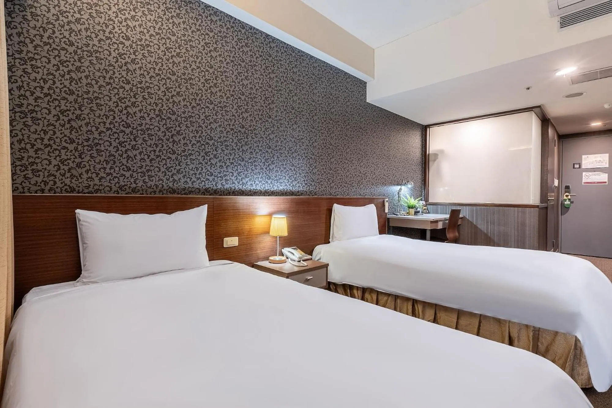 Bed in The Galerie Hotel