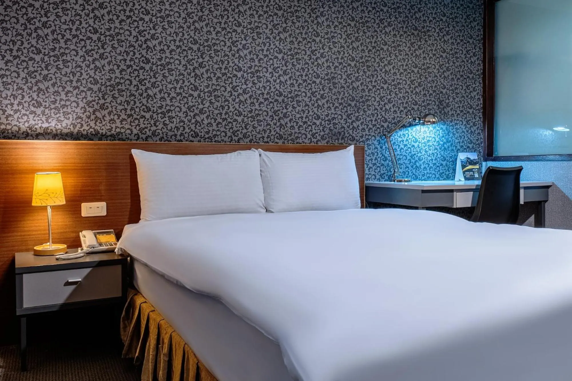 Bed in The Galerie Hotel