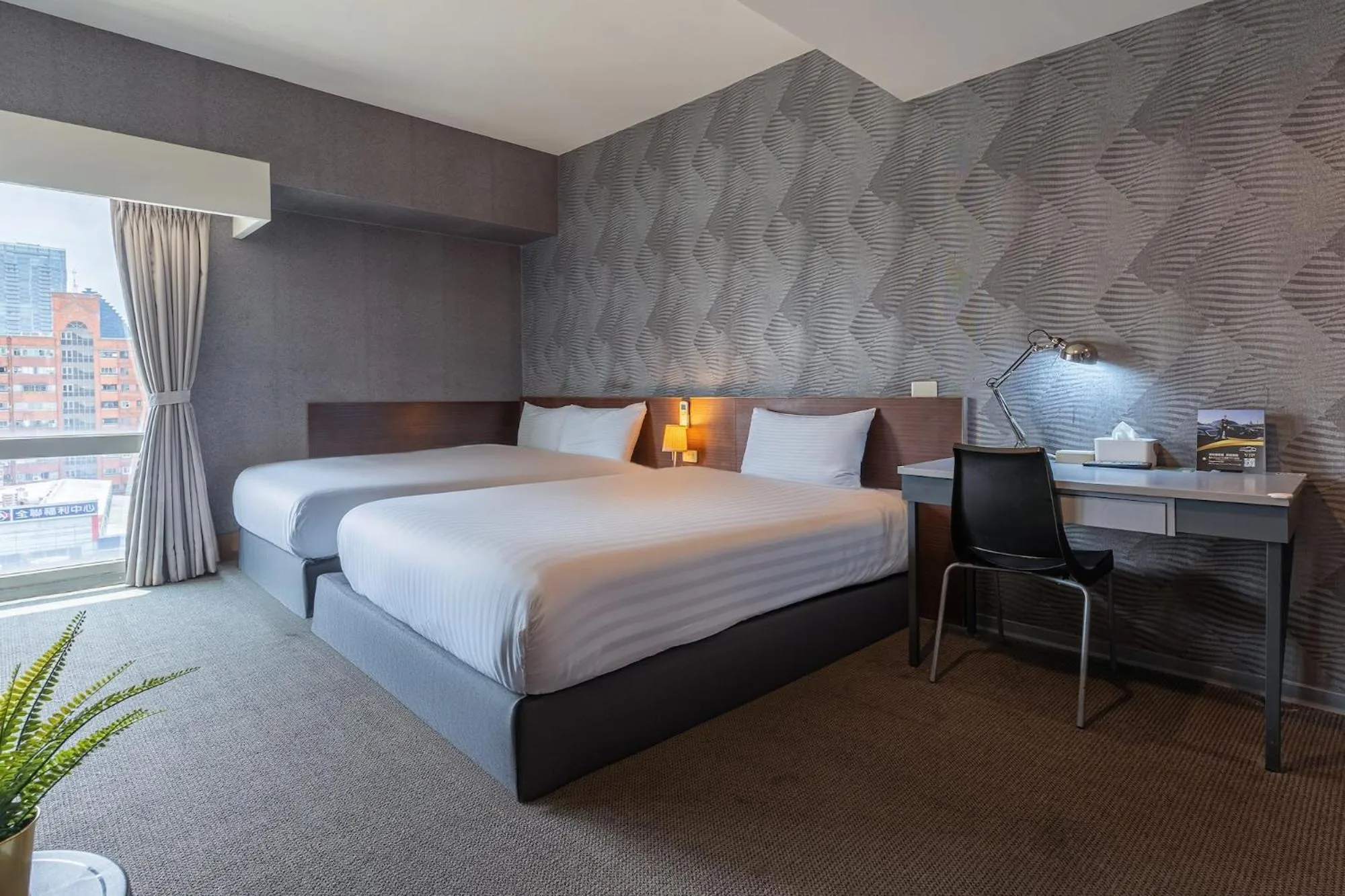 Bed in The Galerie Hotel