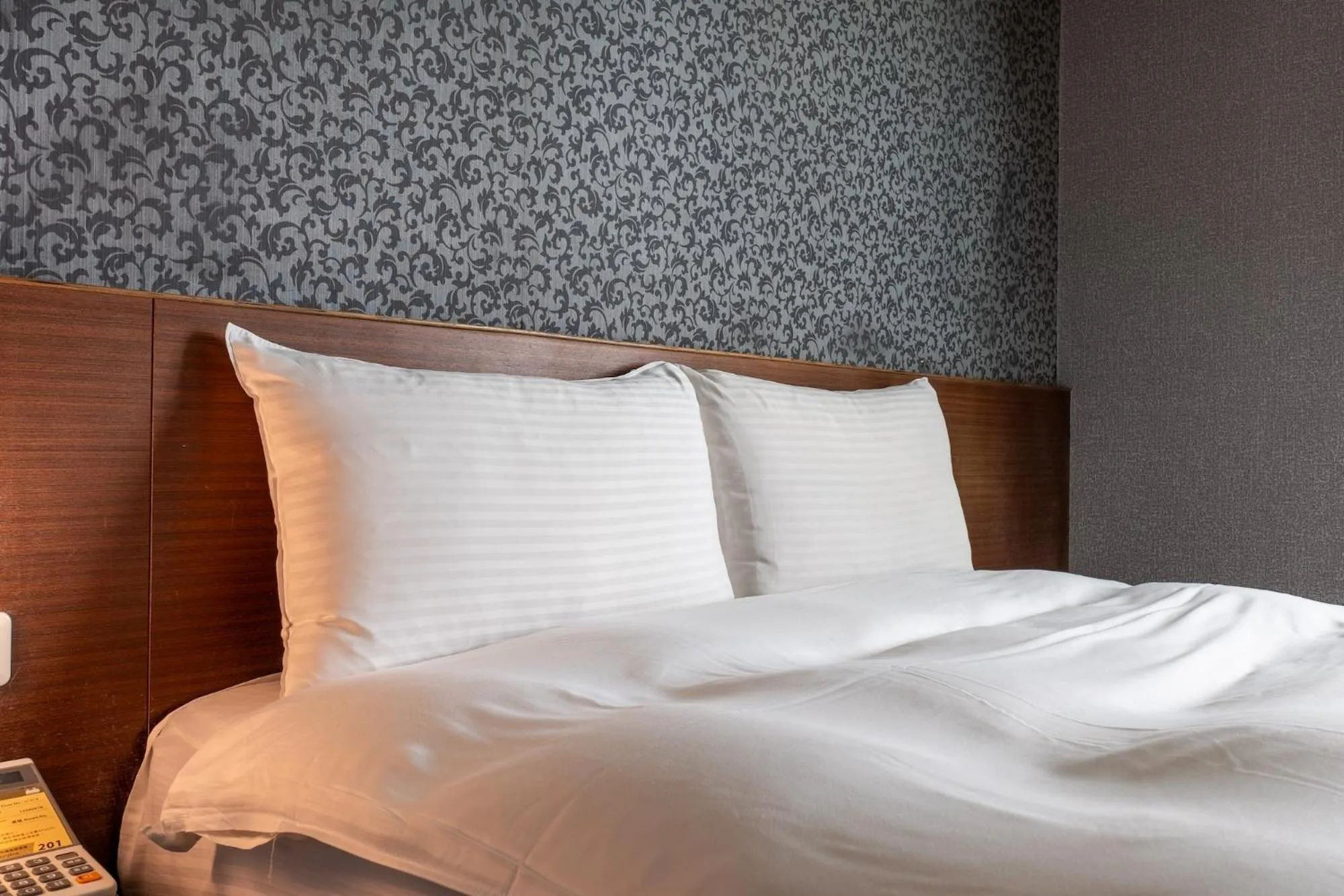 Bed in The Galerie Hotel