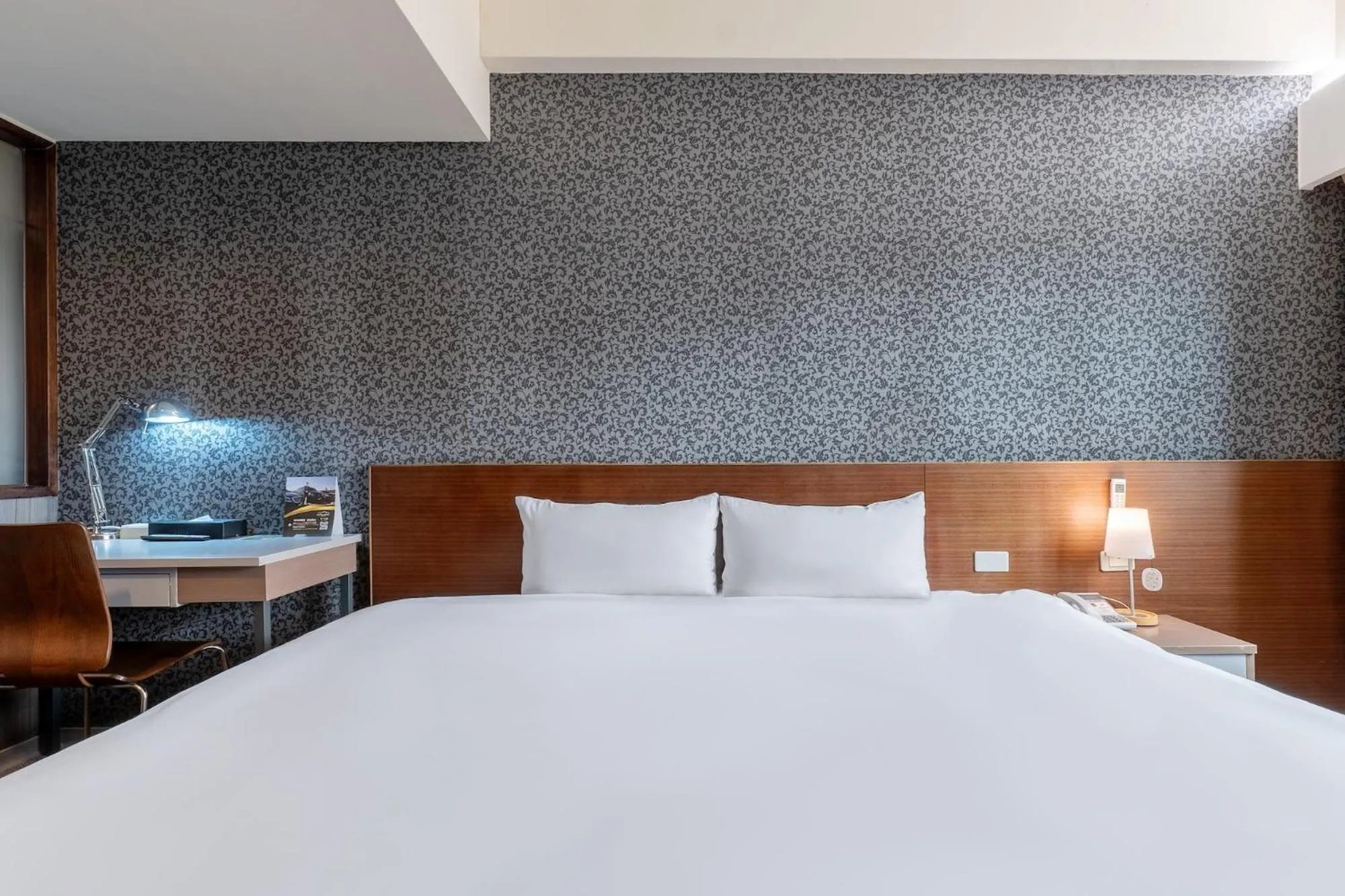 Bed in The Galerie Hotel