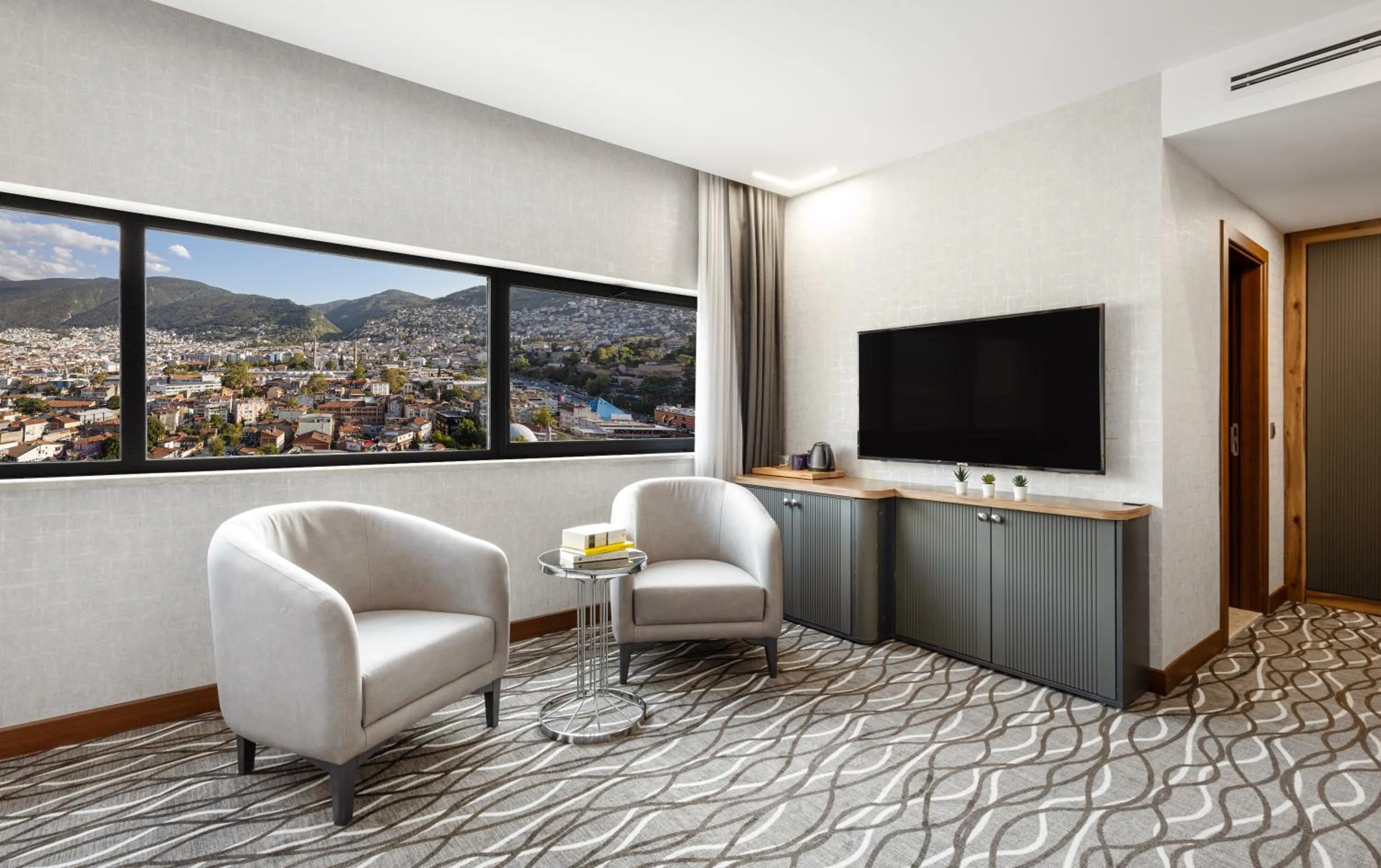 Seating area in Lilium Hotel & Suites