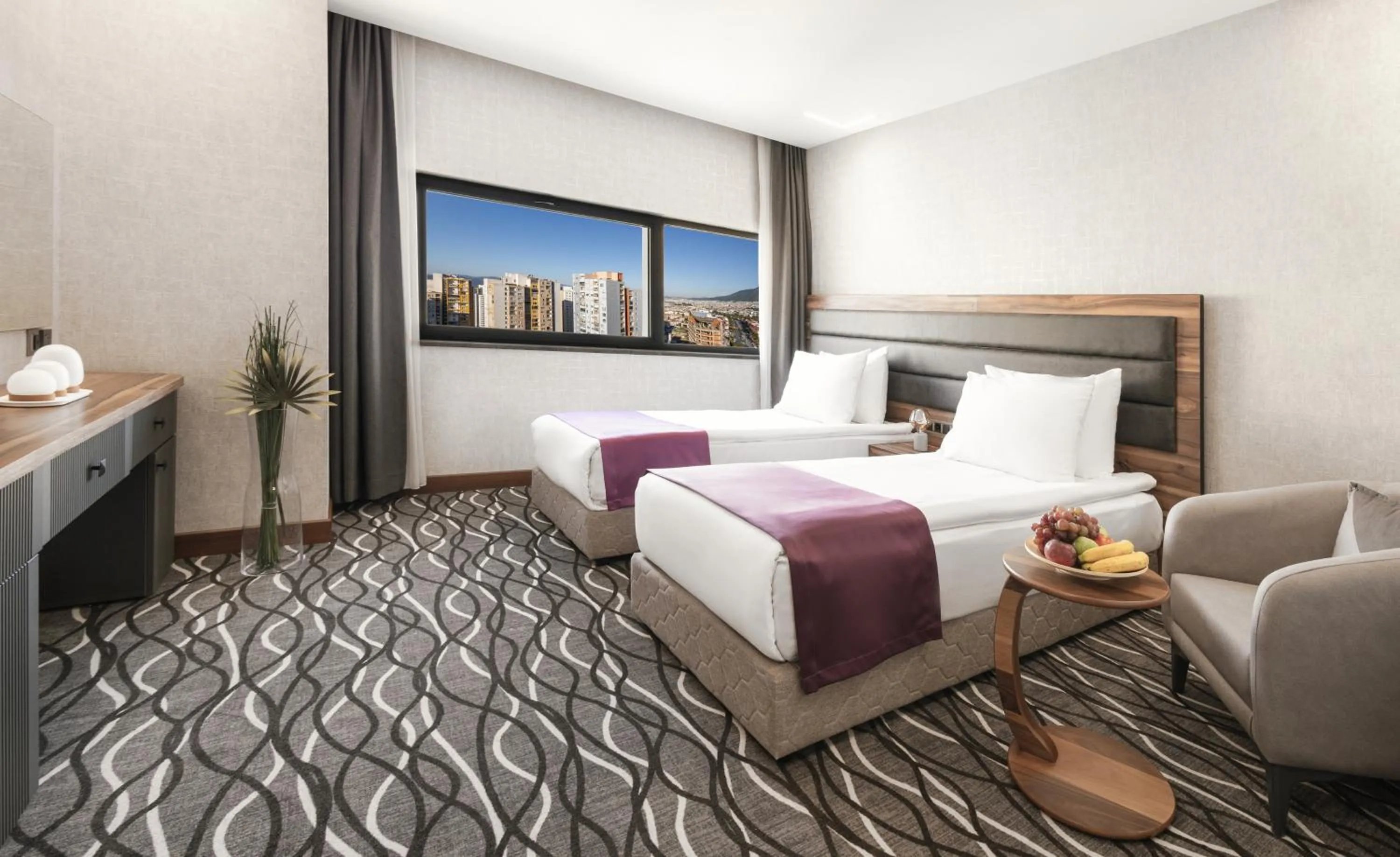 Bed in Lilium Hotel & Suites