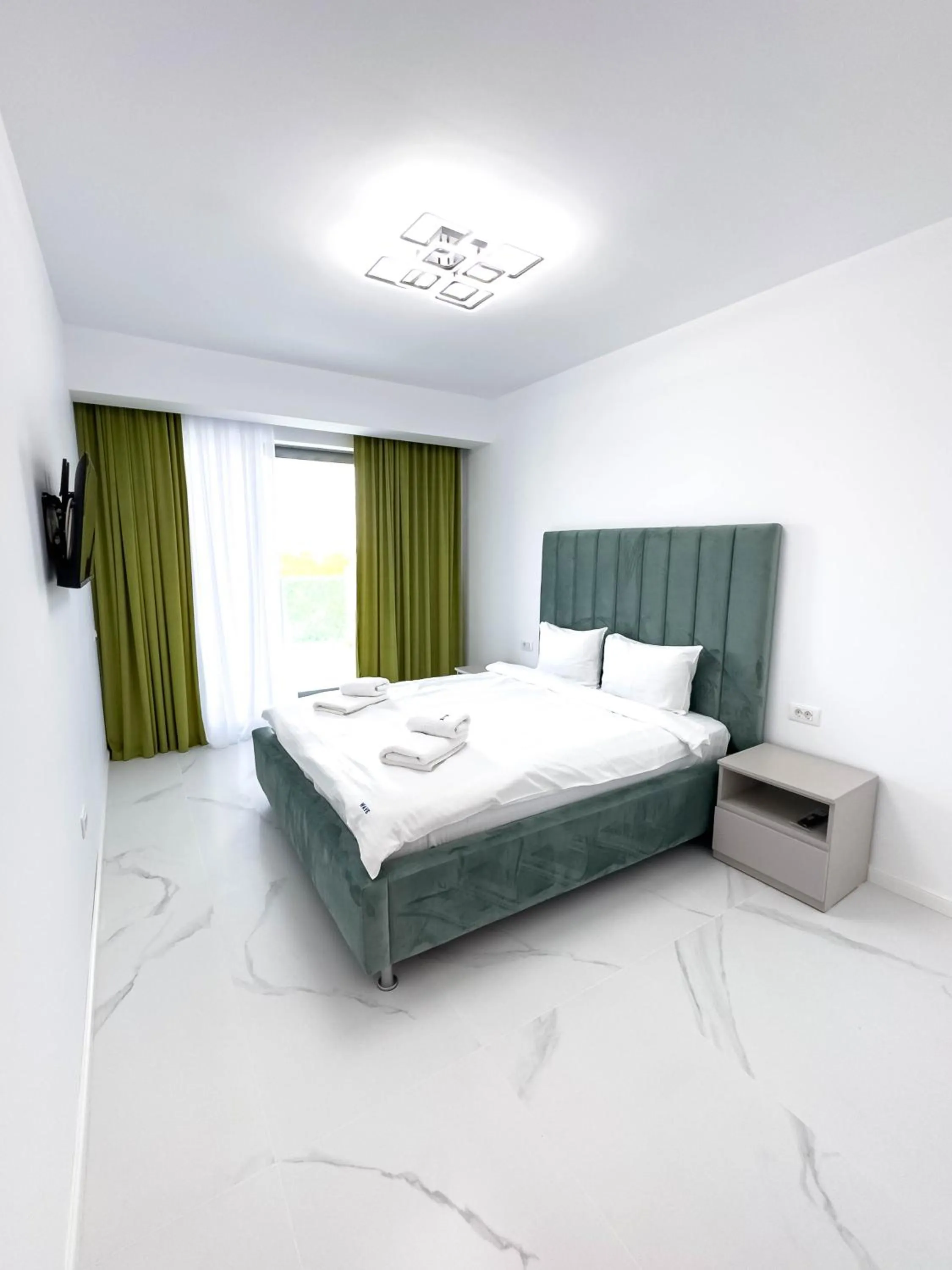 Bed in Wave 6 Apartments