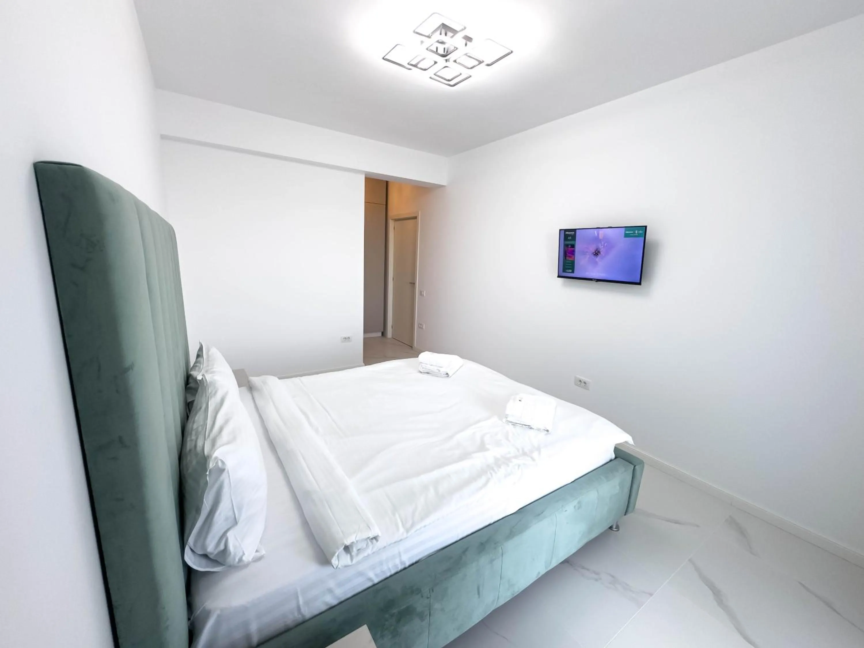 Bed in Wave 6 Apartments