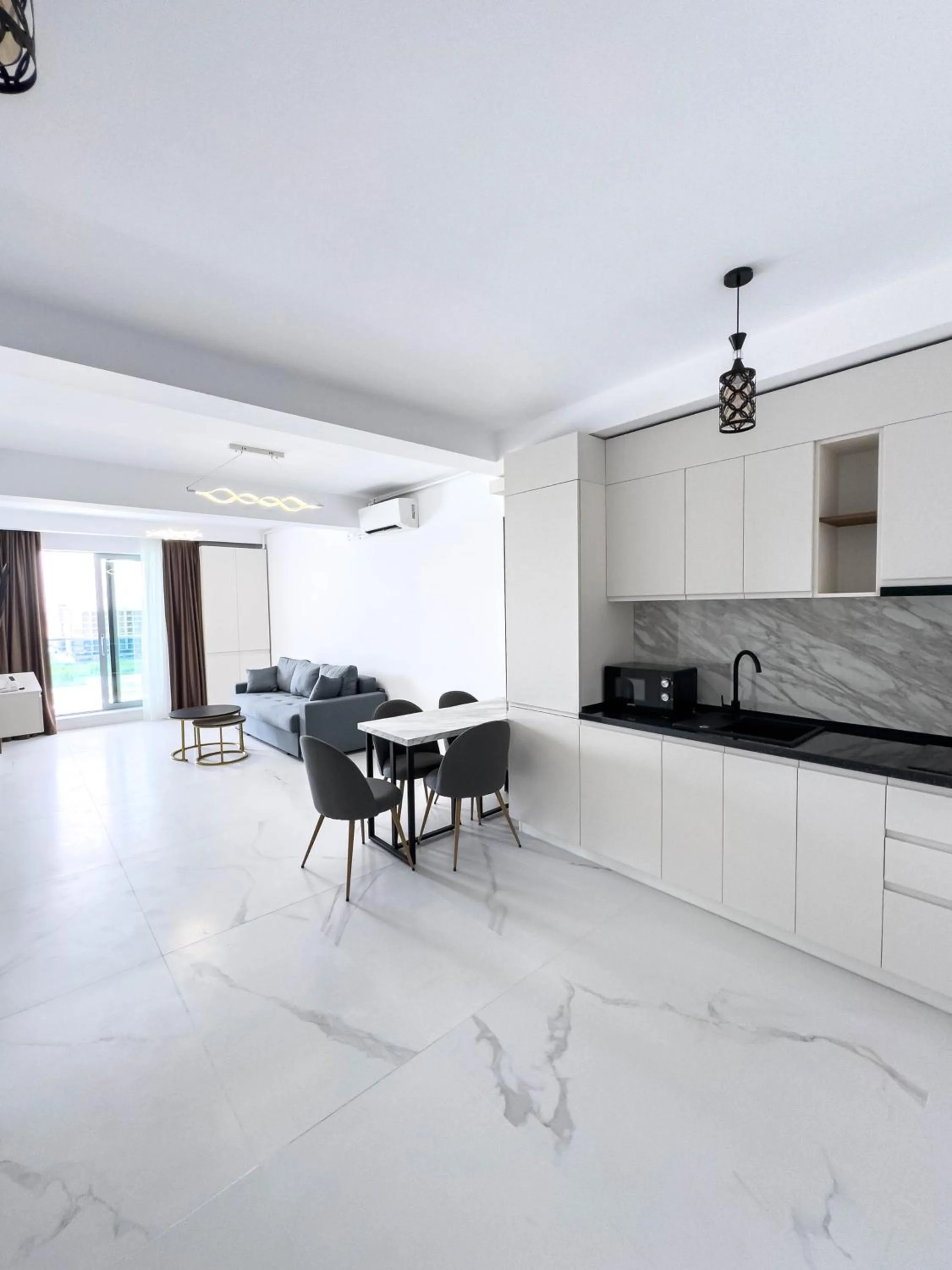 Kitchen or kitchenette in Wave 6 Apartments