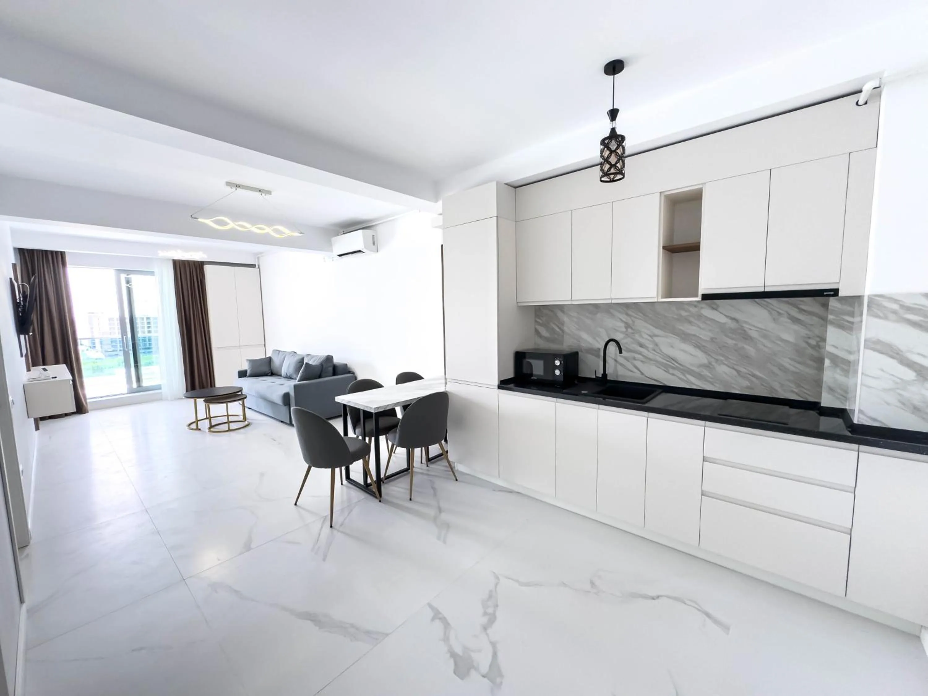 Kitchen or kitchenette in Wave 6 Apartments