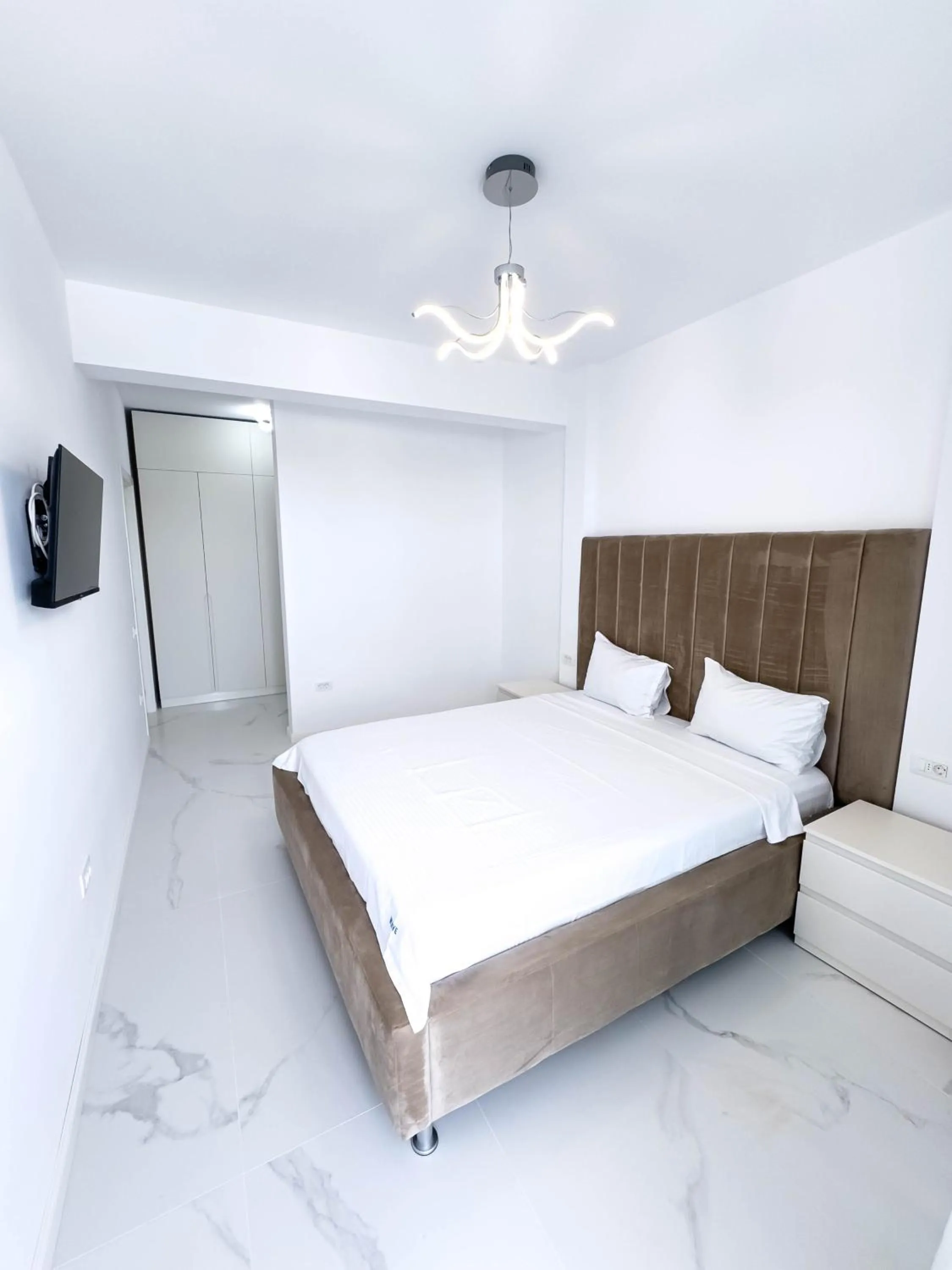 Bed in Wave 6 Apartments