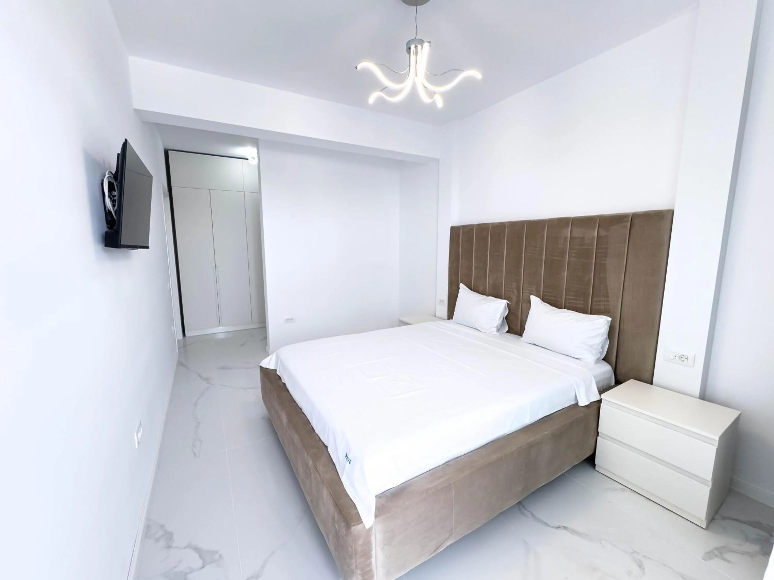 Bed in Wave 6 Apartments