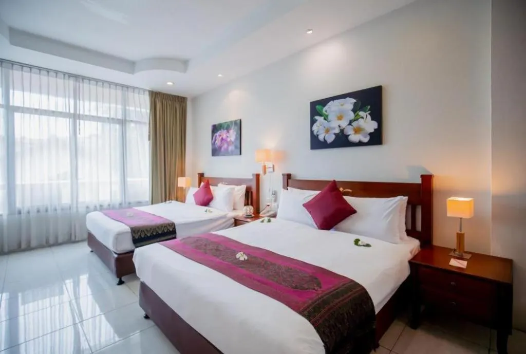 Bed in Hyton Leelavadee Hotel