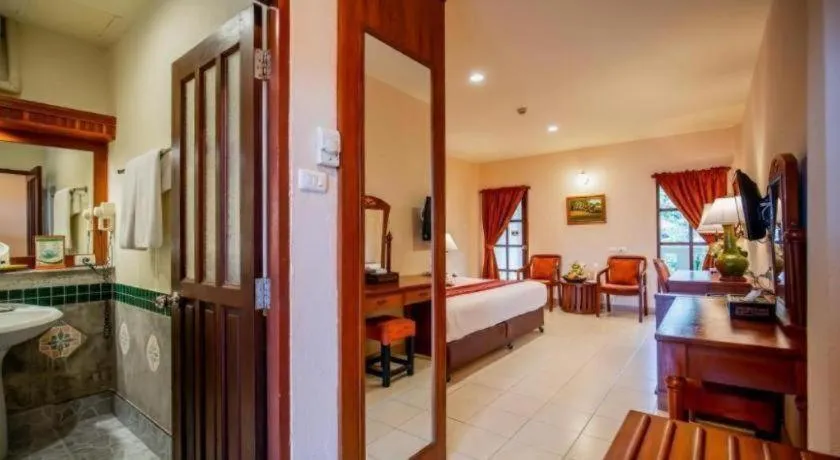 Bed in Hyton Leelavadee Hotel