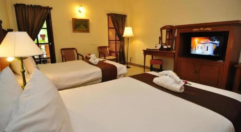 Bed in Hyton Leelavadee Hotel