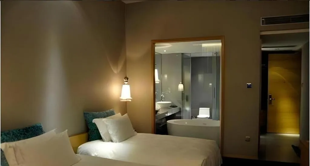 Bed in Guangzhou Carat Hotel