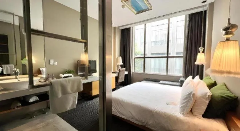 Bed in Guangzhou Carat Hotel